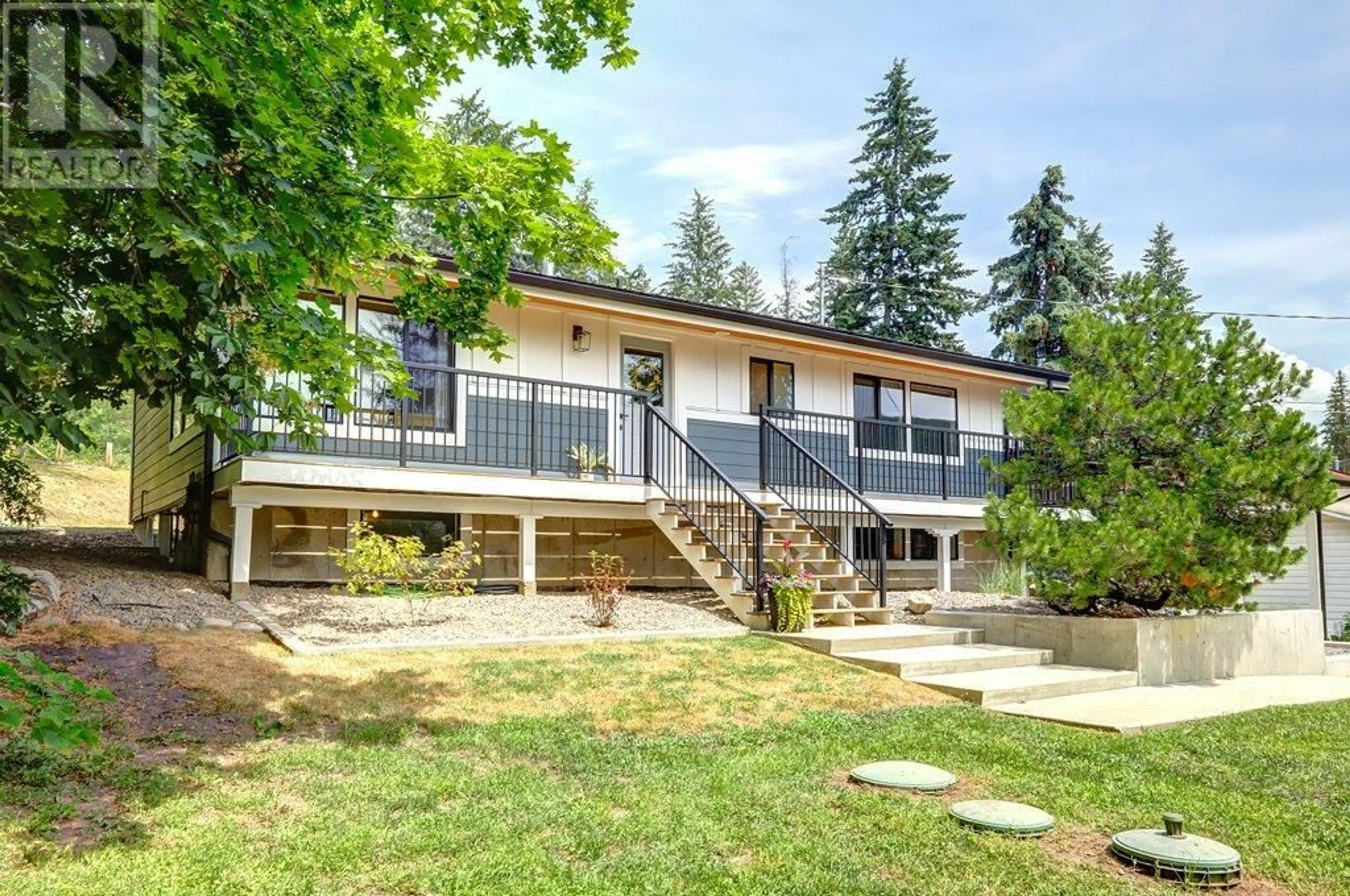 Home with vinyl exterior material, mountain view for 7629 SILVER STAR ROAD, Vernon British Columbia V1B3N7