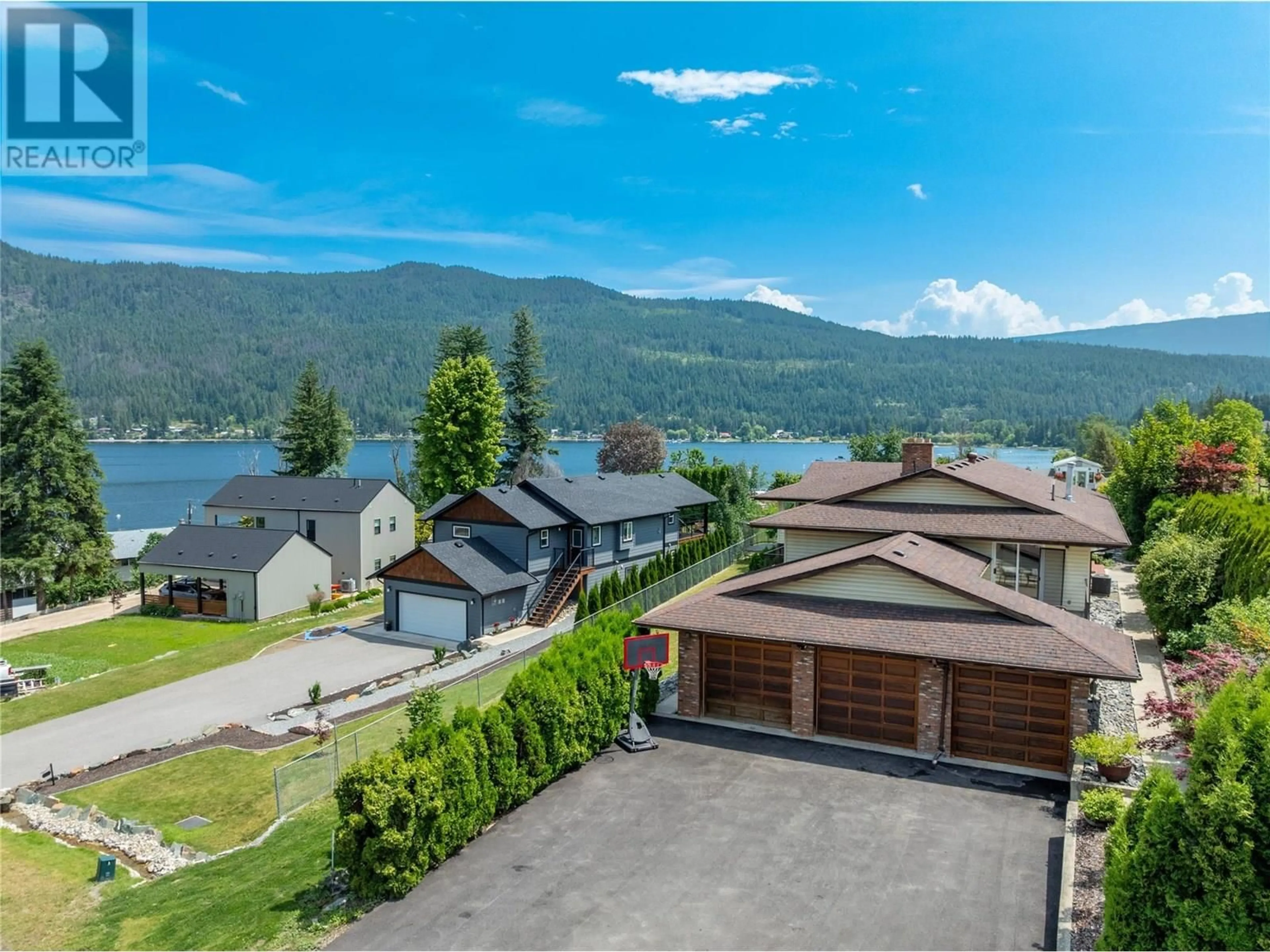 A pic from outside/outdoor area/front of a property/back of a property/a pic from drone, water/lake/river/ocean view for 2484 SUNRISE BOULEVARD, Blind Bay British Columbia V0E2W2