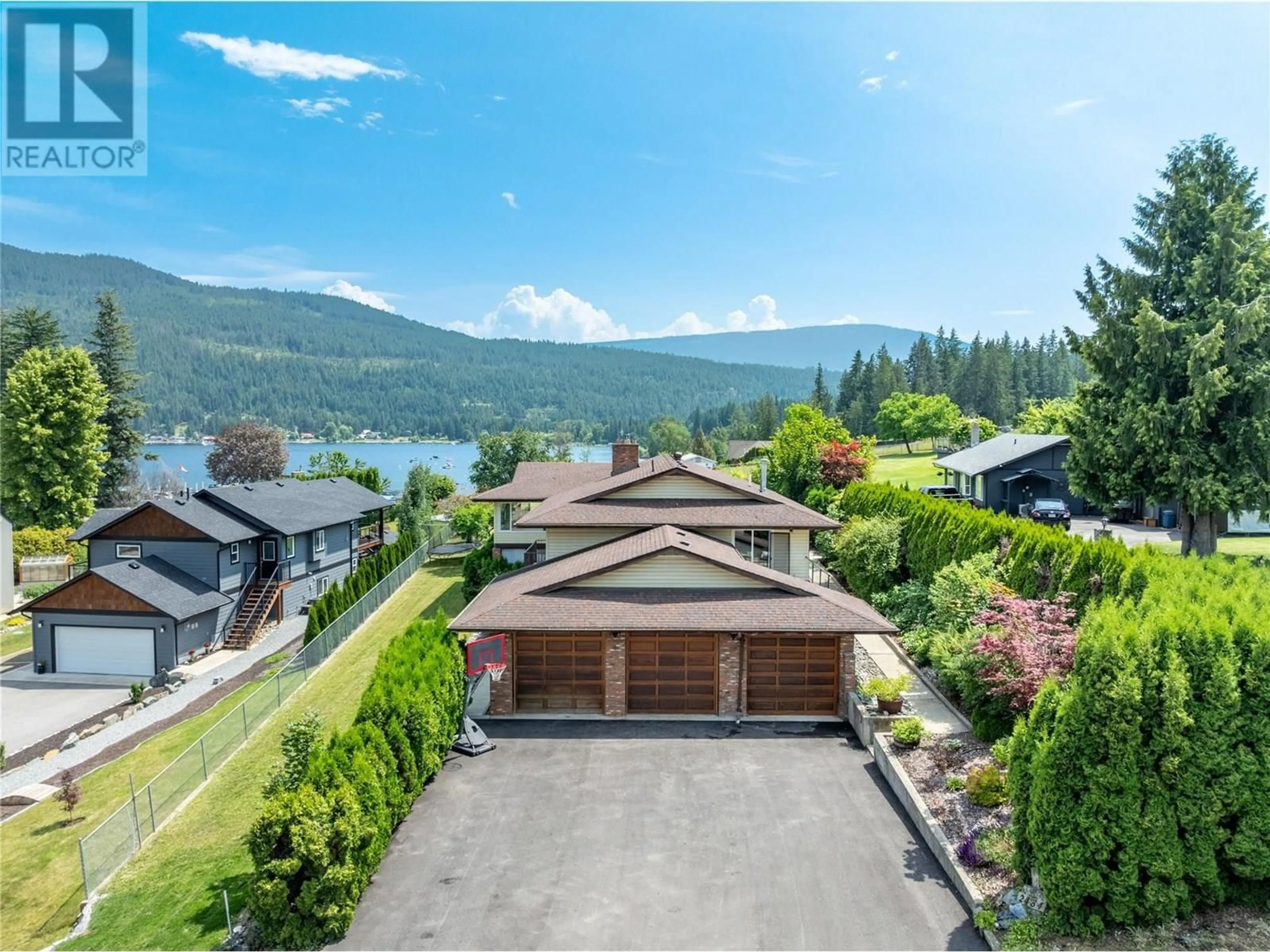 A pic from outside/outdoor area/front of a property/back of a property/a pic from drone, water/lake/river/ocean view for 2484 SUNRISE BOULEVARD, Blind Bay British Columbia V0E2W2