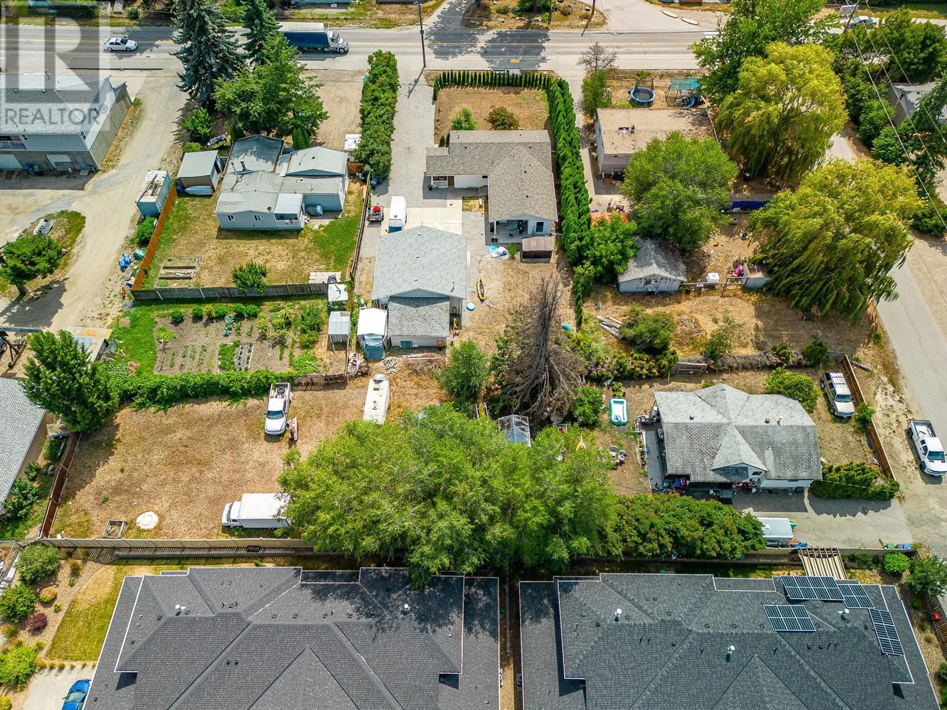 A pic from outside/outdoor area/front of a property/back of a property/a pic from drone, street for 9543 JENSEN ROAD, Lake Country British Columbia V1V1S6