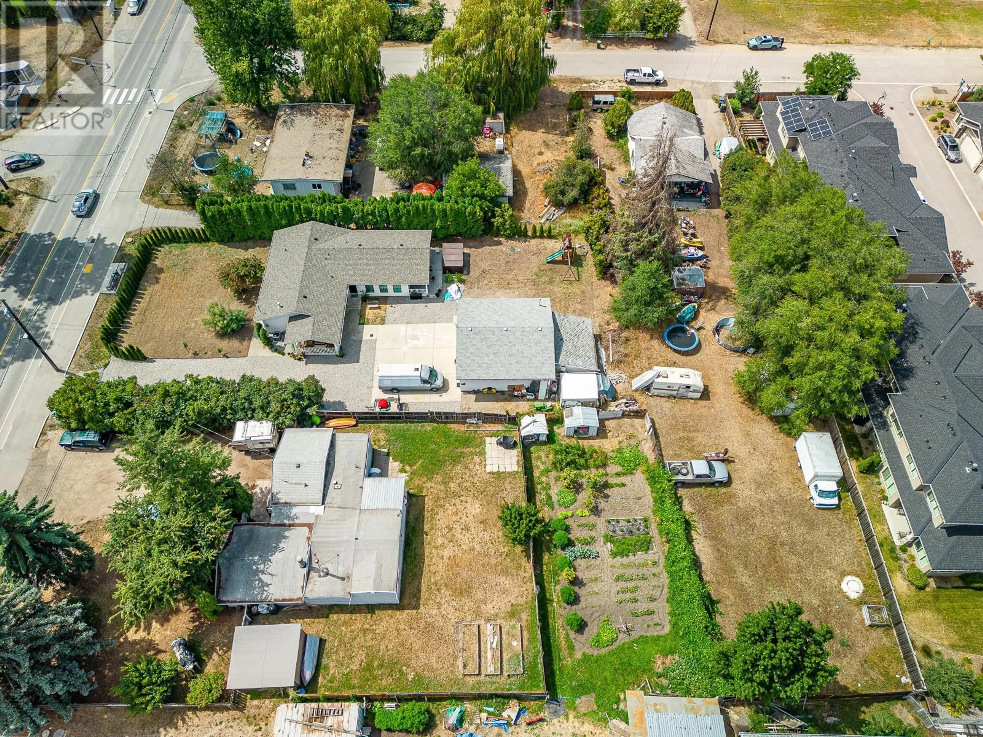 A pic from outside/outdoor area/front of a property/back of a property/a pic from drone, street for 9543 JENSEN ROAD, Lake Country British Columbia V1V1S6