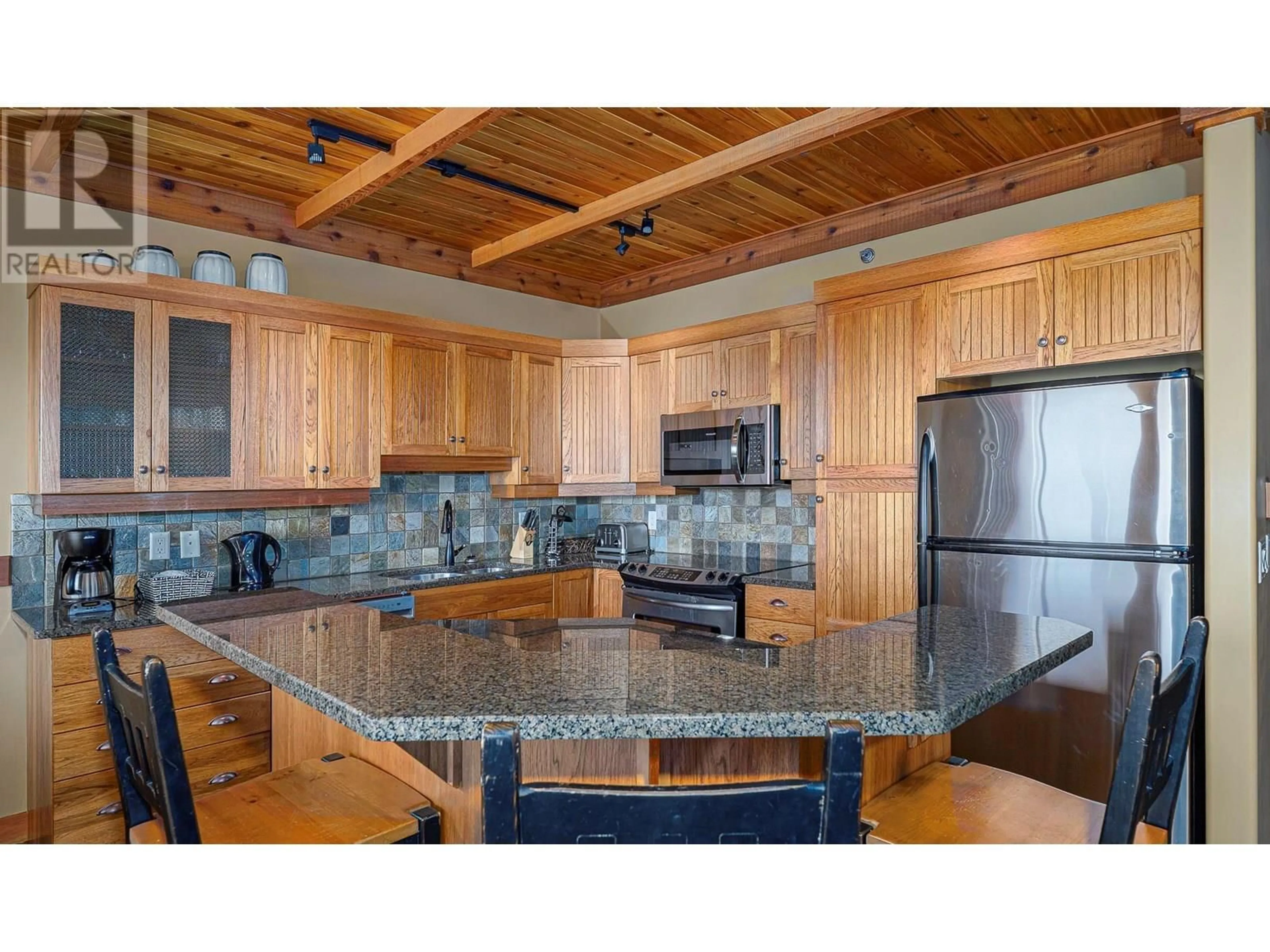 Open concept kitchen, unknown for 112 - 250 FEATHERTOP WAY, Big White British Columbia V1P1T4