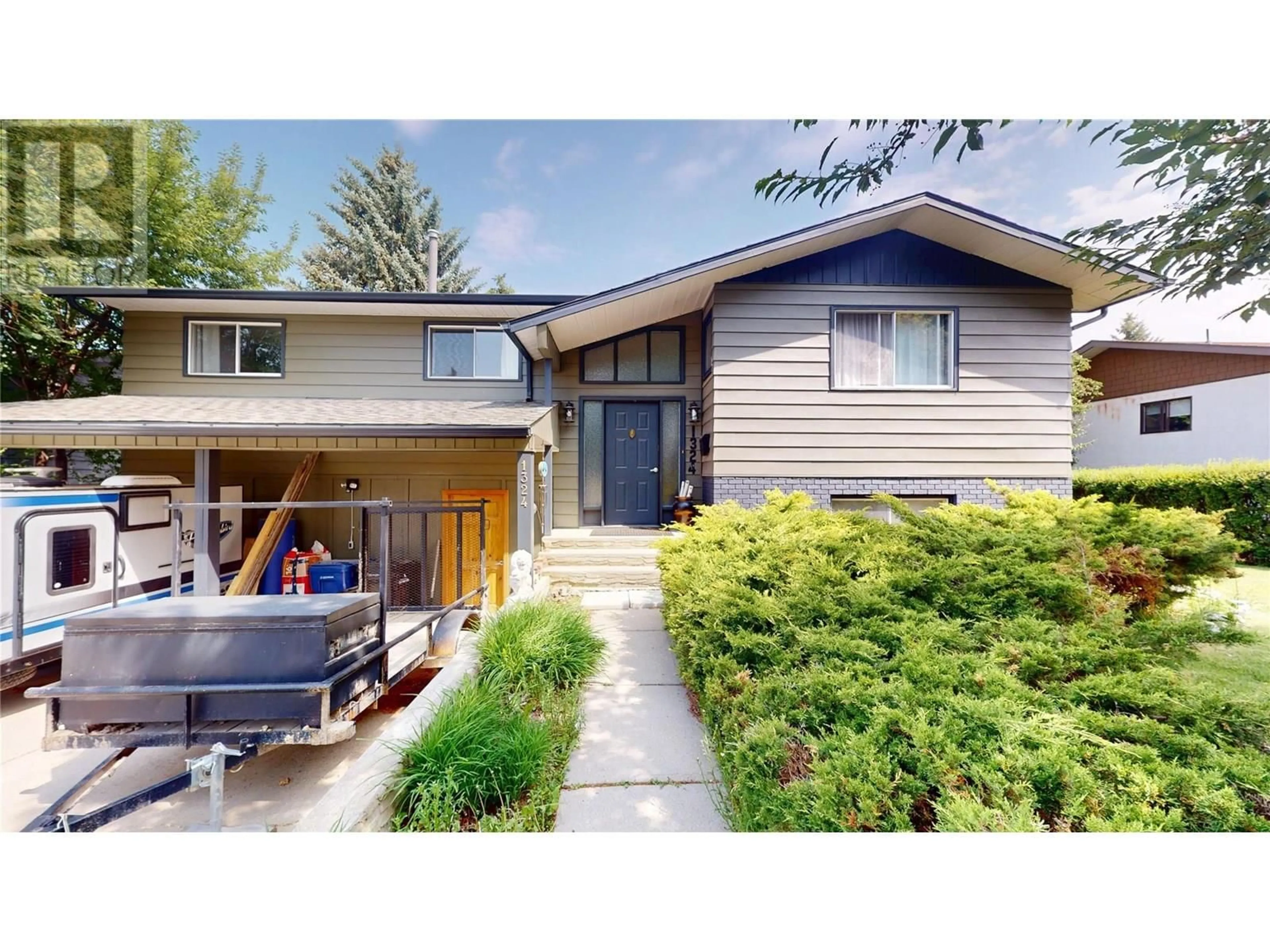 Home with vinyl exterior material, street for 1324 14TH STREET SOUTH, Cranbrook British Columbia V1C5E8