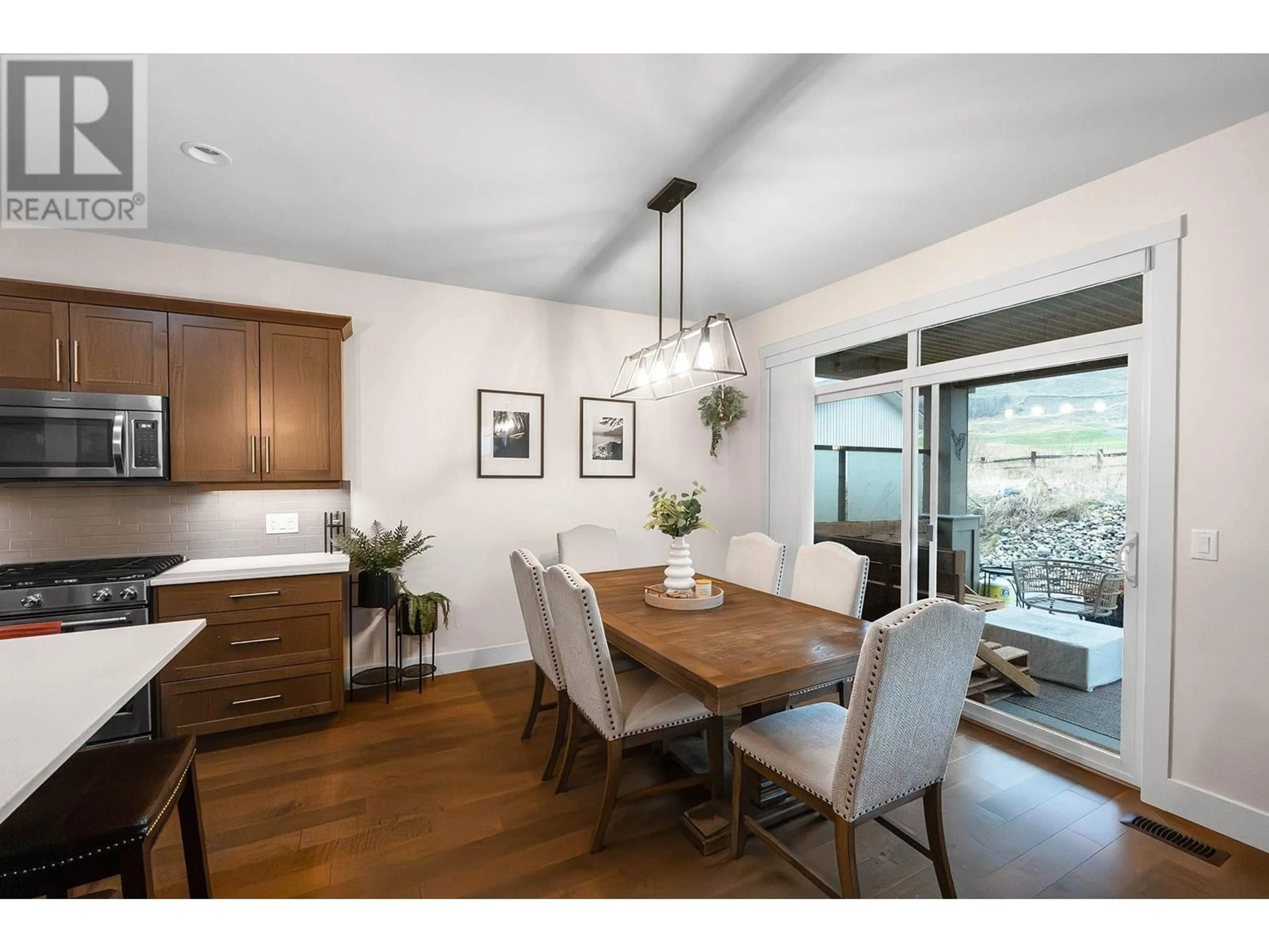 Dining room, wood/laminate floor for 1769 TOWER RANCH DRIVE, Kelowna British Columbia V1P1T2