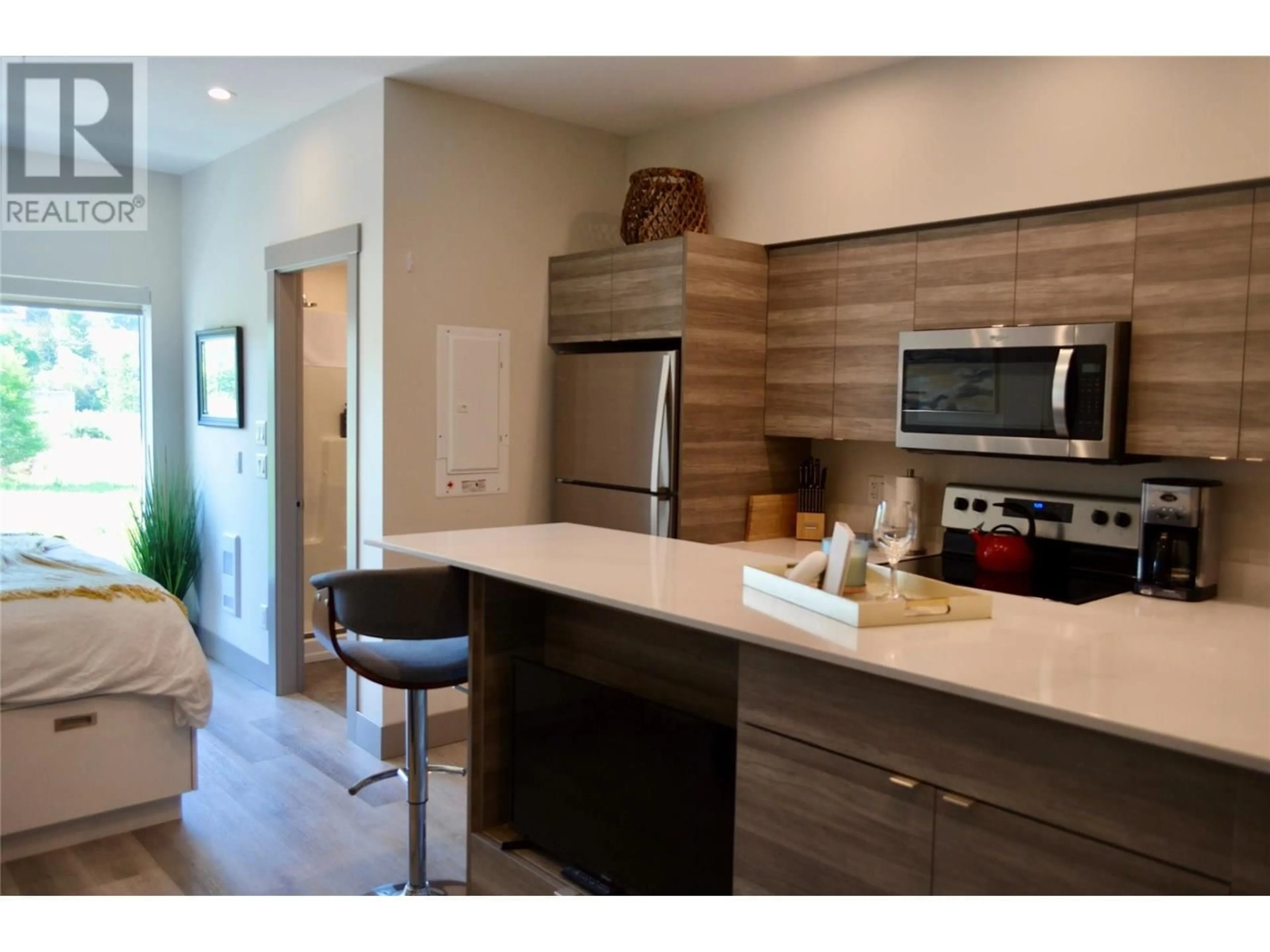 Contemporary kitchen, ceramic/tile floor for 221 - 2555 LAKESHORE ROAD, Vernon British Columbia V1H0A4