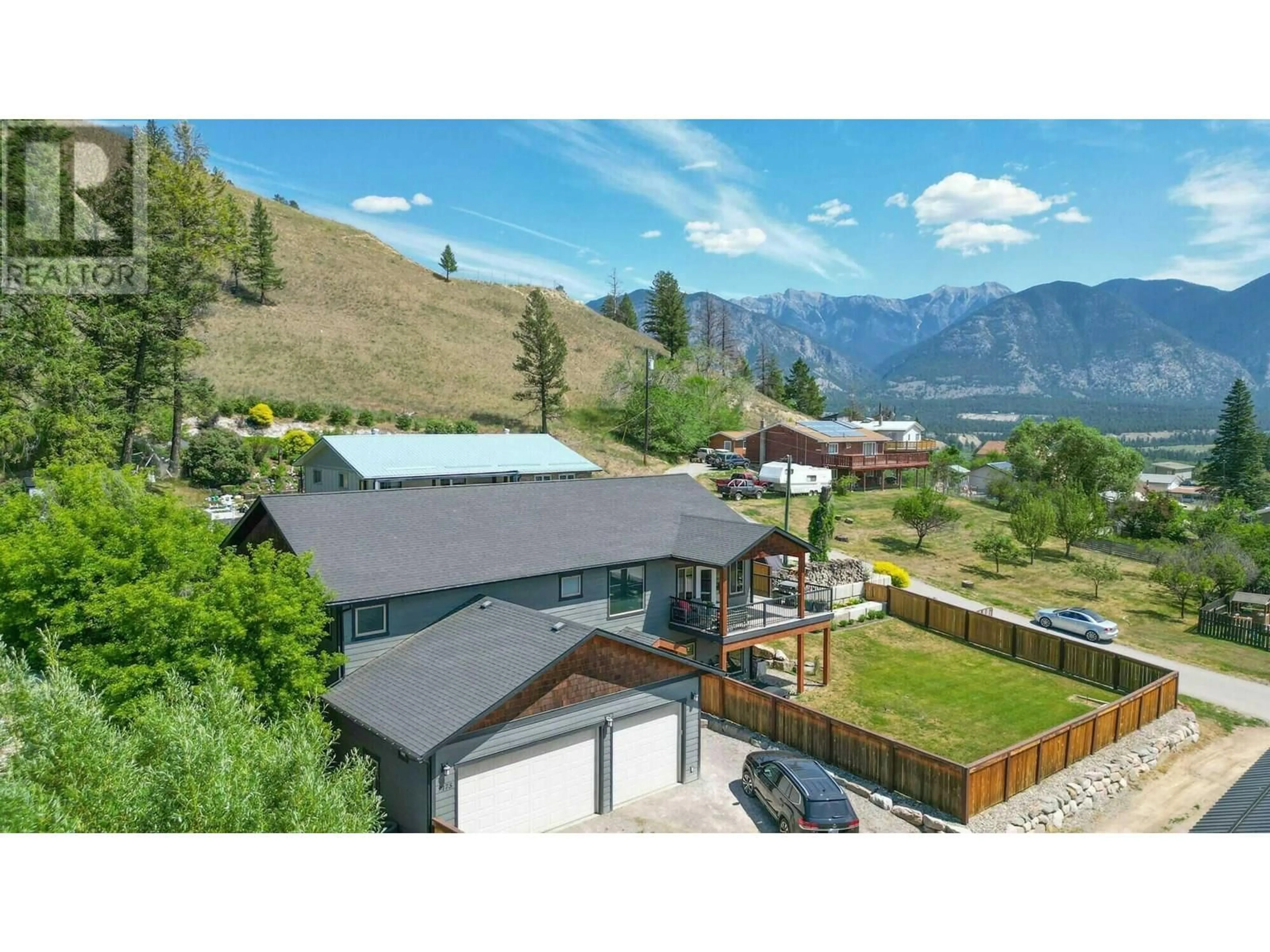 A pic from outside/outdoor area/front of a property/back of a property/a pic from drone, mountain view for 9175 WEST AVENUE, Wilmer British Columbia V0A1K5