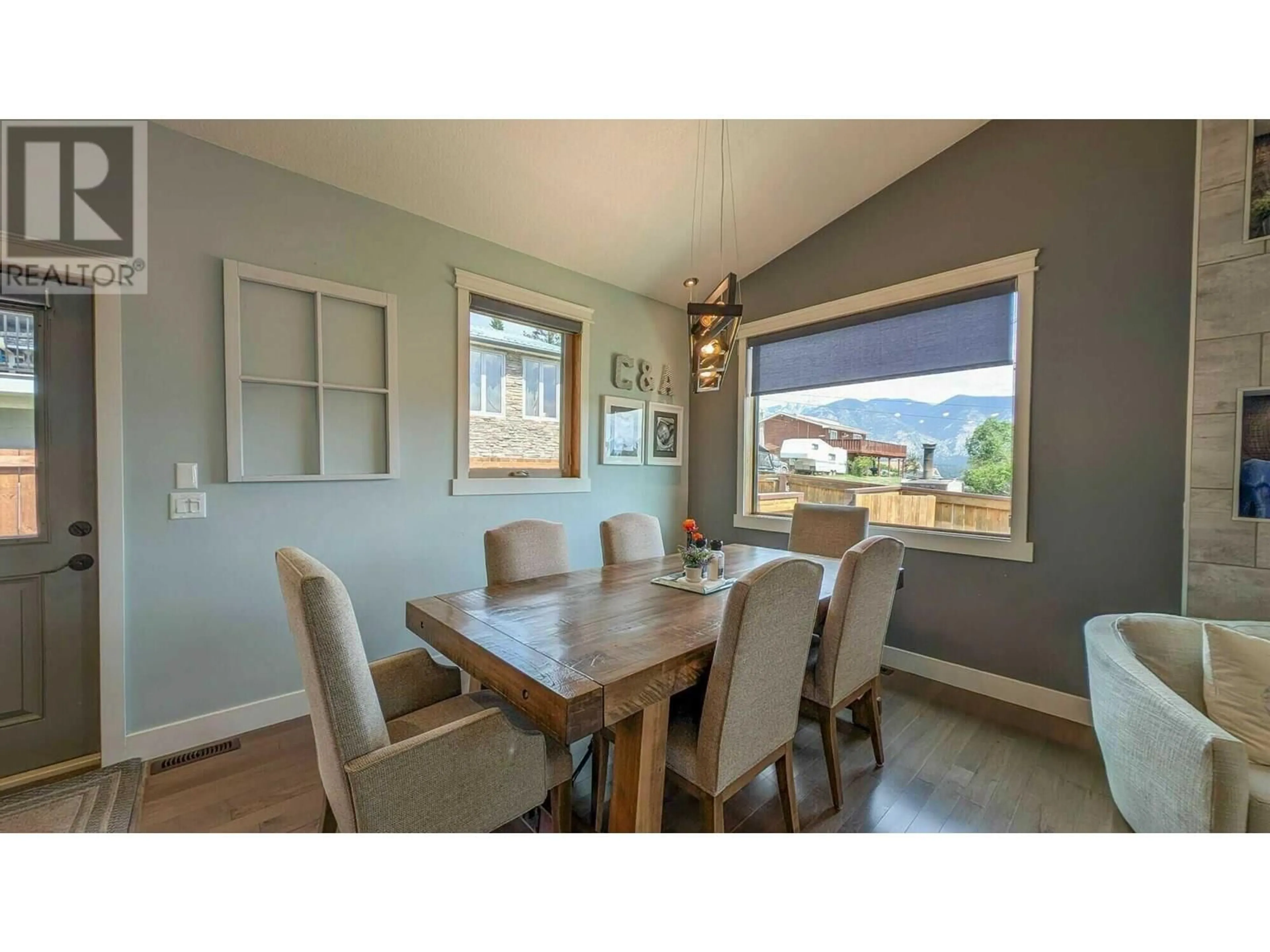 Dining room, wood/laminate floor for 9175 WEST AVENUE, Wilmer British Columbia V0A1K5