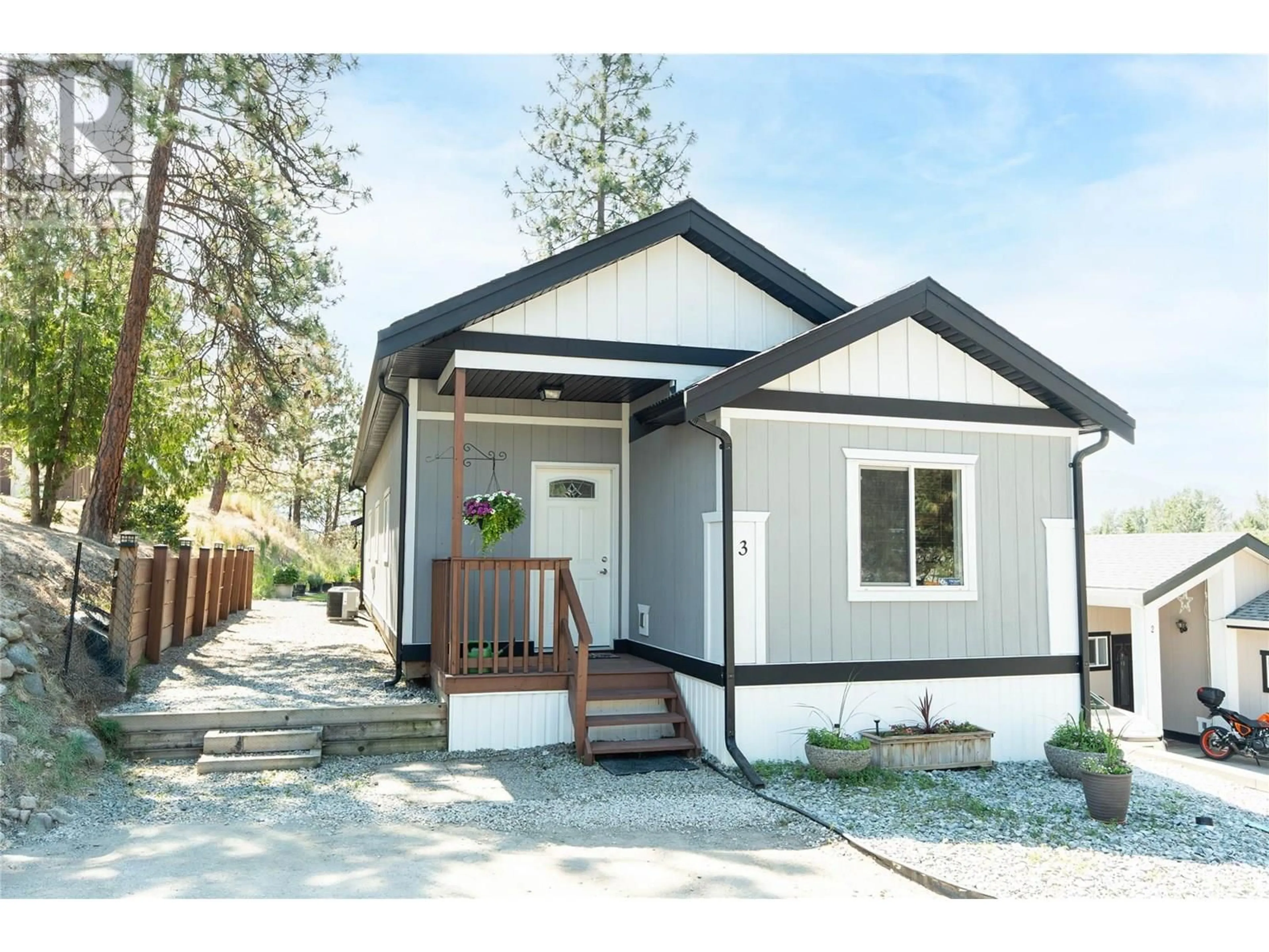 Home with vinyl exterior material, street for 3 - 1860 BOUCHERIE ROAD, West Kelowna British Columbia V4T1Z9