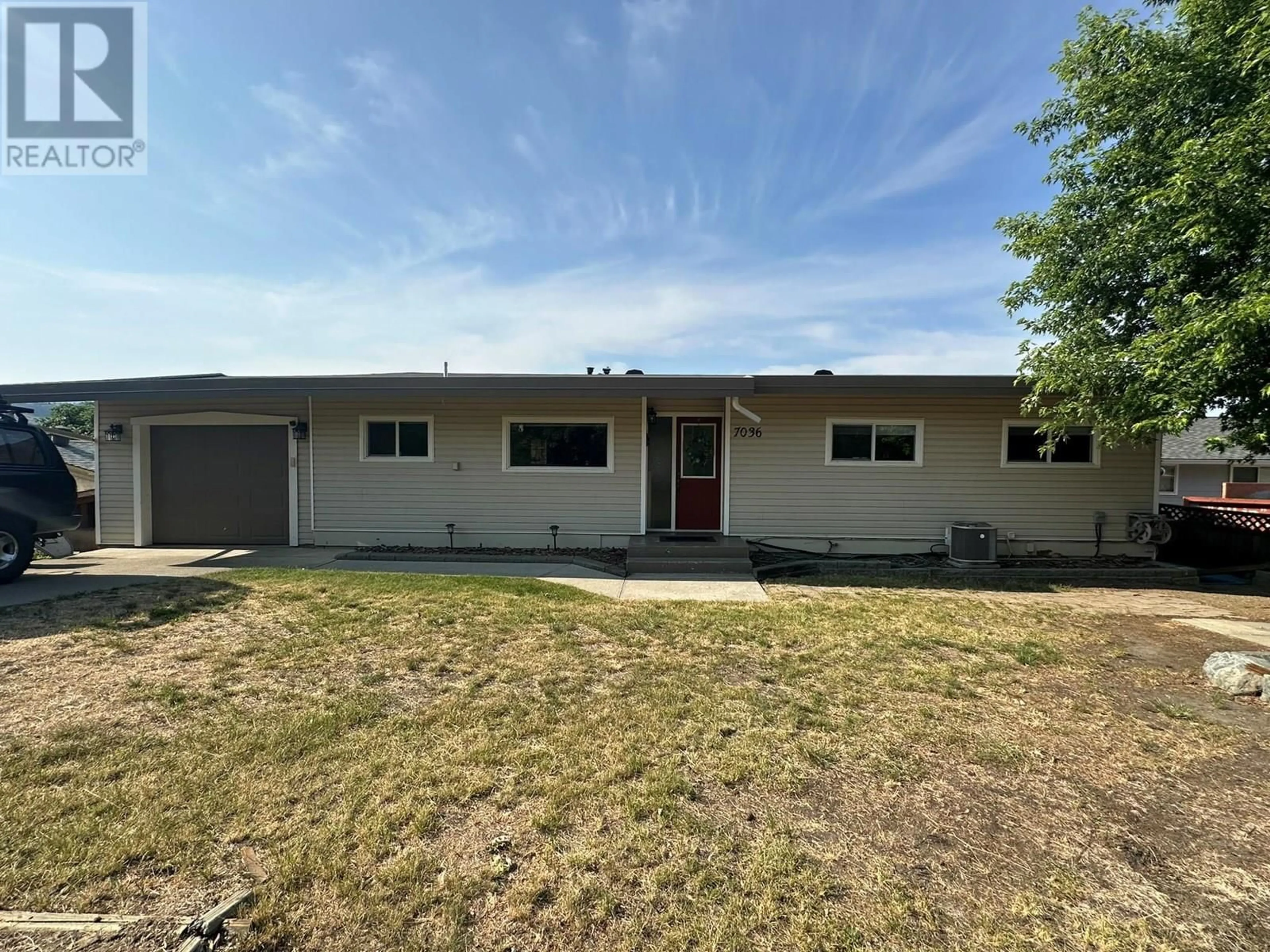 Home with vinyl exterior material, street for 7036 APPALOOSA WAY, Vernon British Columbia V1H1B9