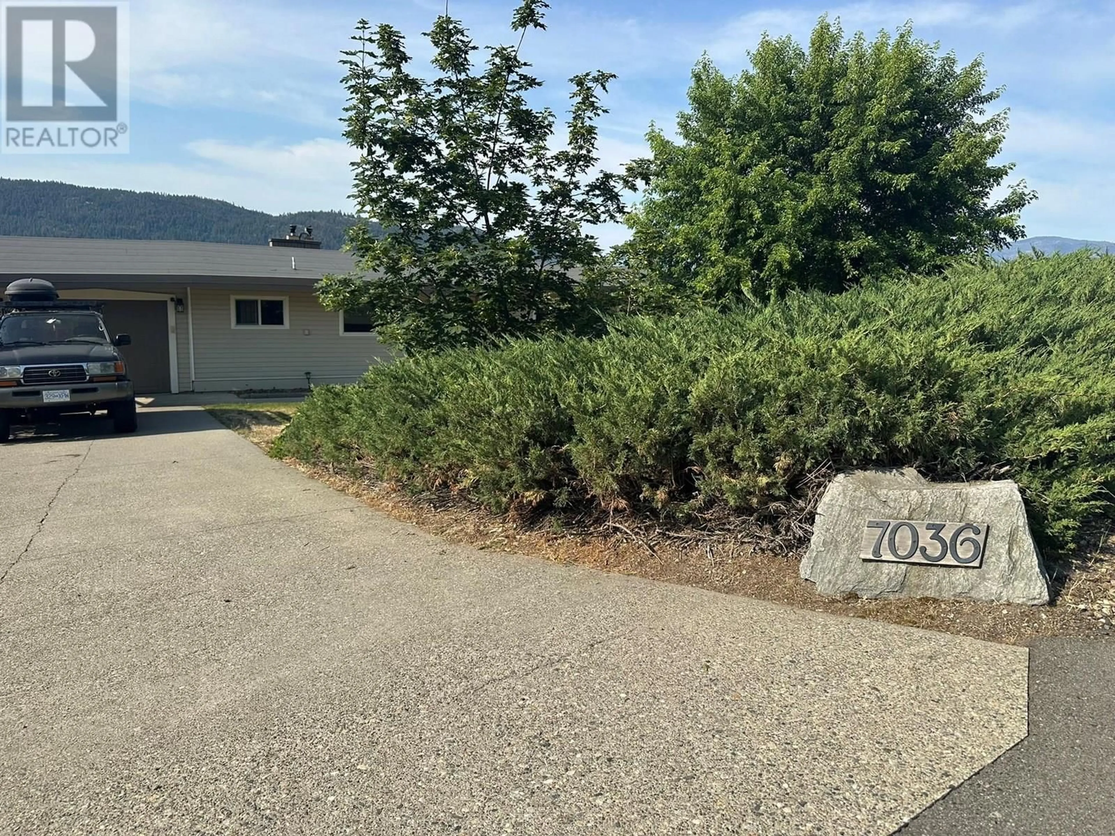 A pic from outside/outdoor area/front of a property/back of a property/a pic from drone, mountain view for 7036 APPALOOSA WAY, Vernon British Columbia V1H1B9