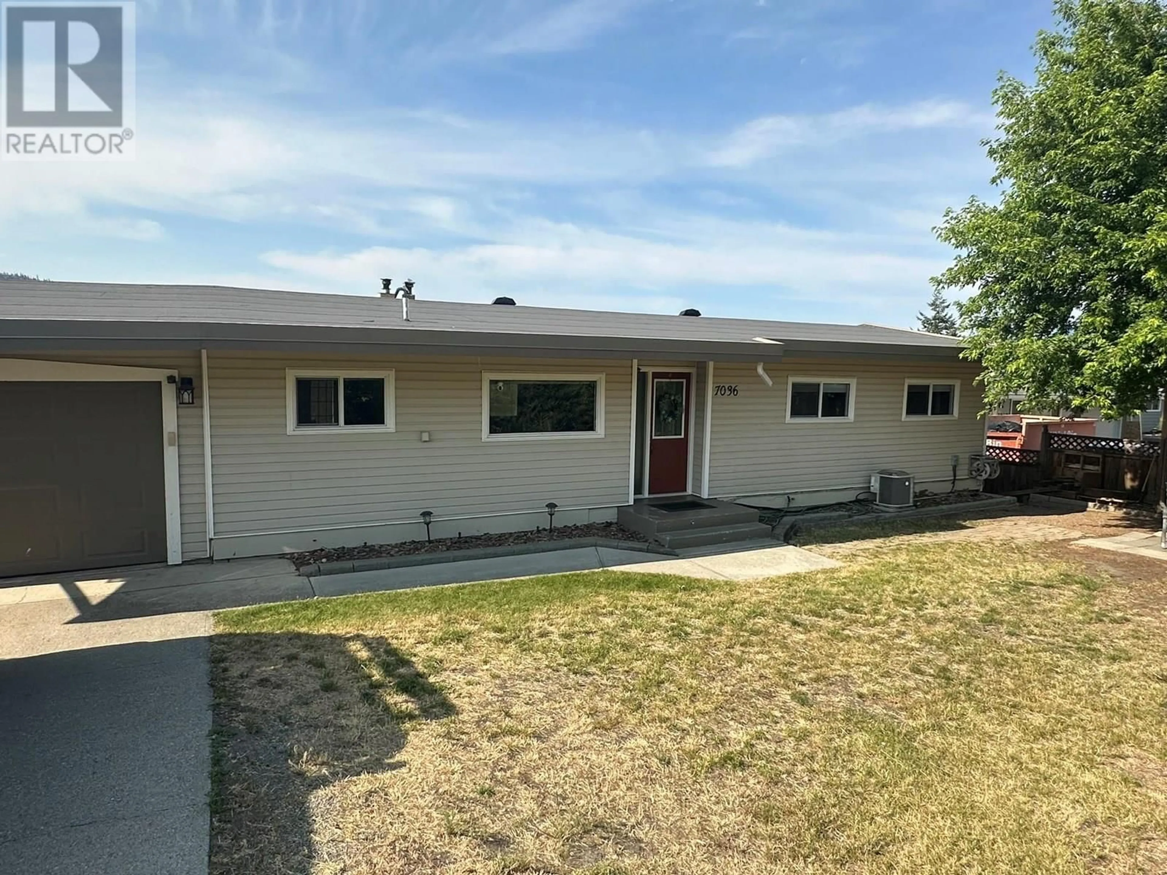Home with vinyl exterior material, street for 7036 APPALOOSA WAY, Vernon British Columbia V1H1B9