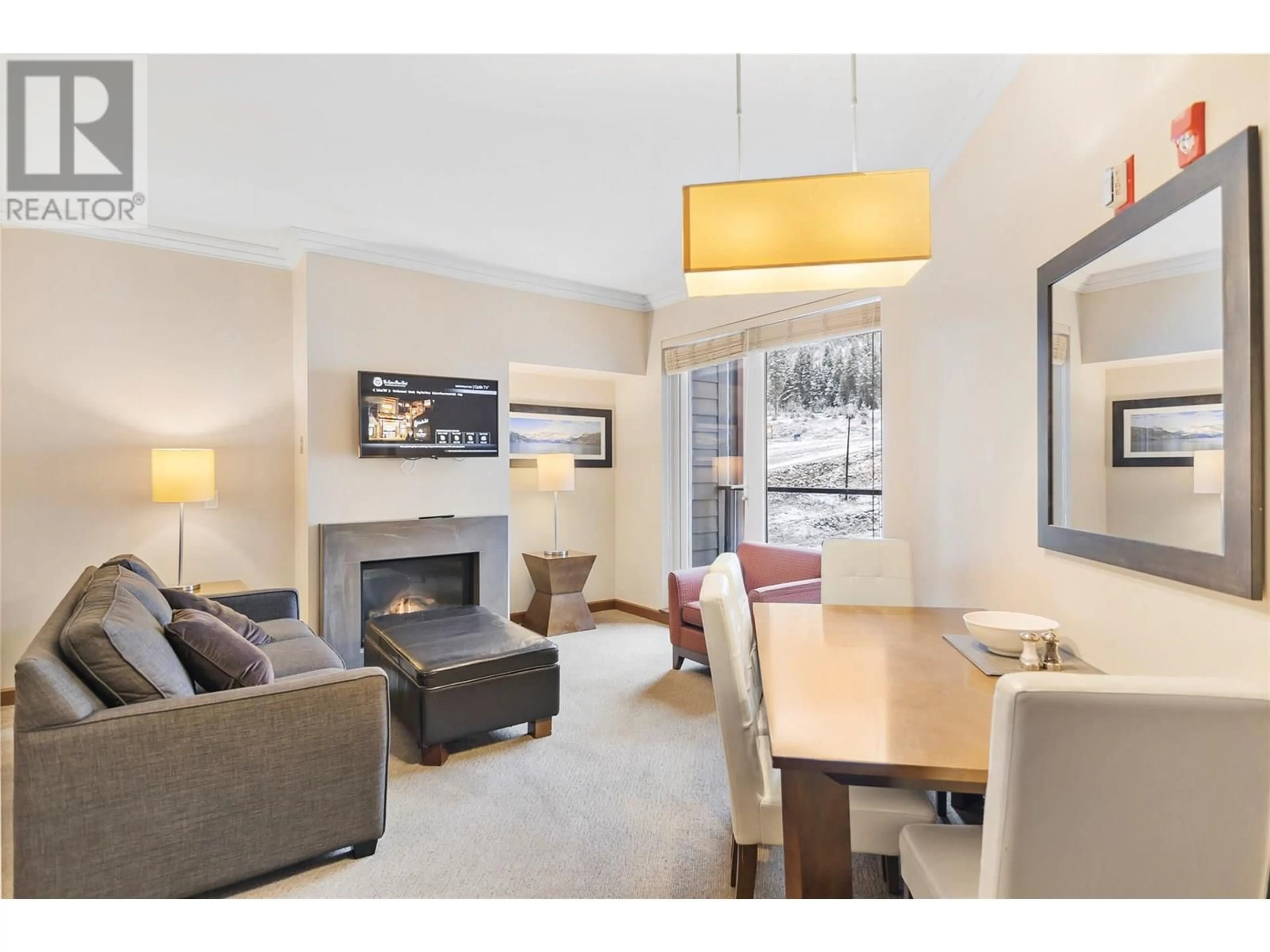 Living room with furniture, wood/laminate floor for 2527 - 2950 CAMOZZI ROAD, Revelstoke British Columbia V0E2S1