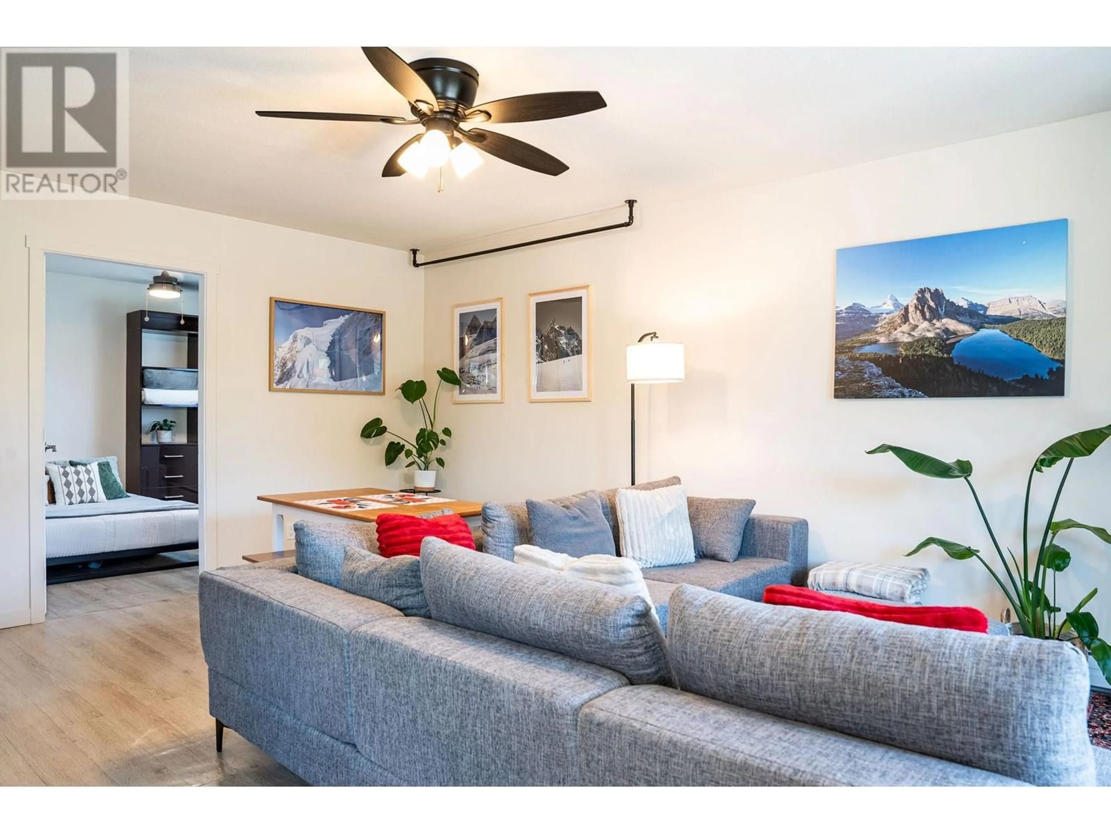 Living room with furniture, wood/laminate floor for 304 - 1211 VICTORIA ROAD, Revelstoke British Columbia V0E2S0
