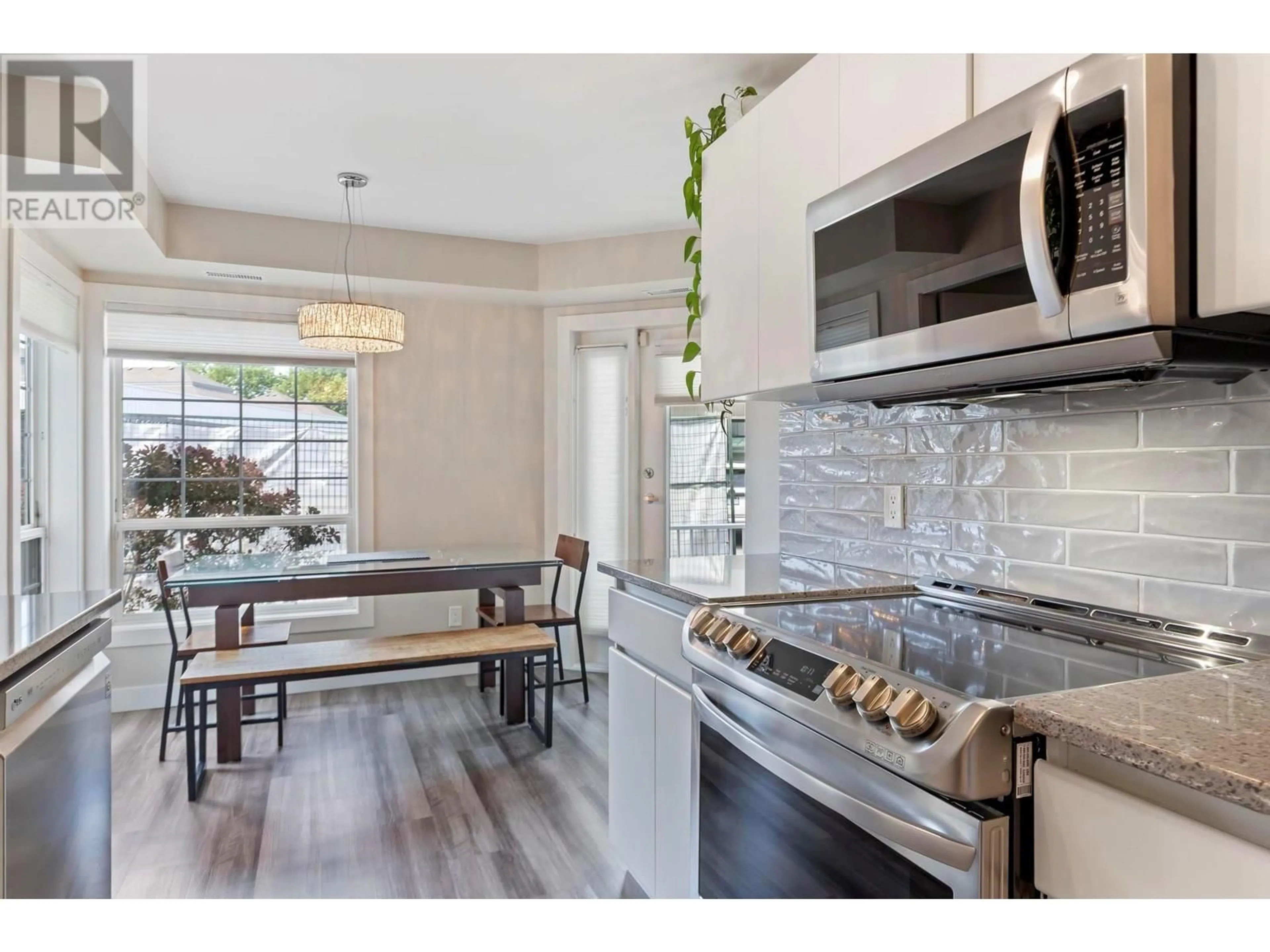 Open concept kitchen, ceramic/tile floor for 117 - 2350 STILLINGFLEET ROAD, Kelowna British Columbia V1W3X9