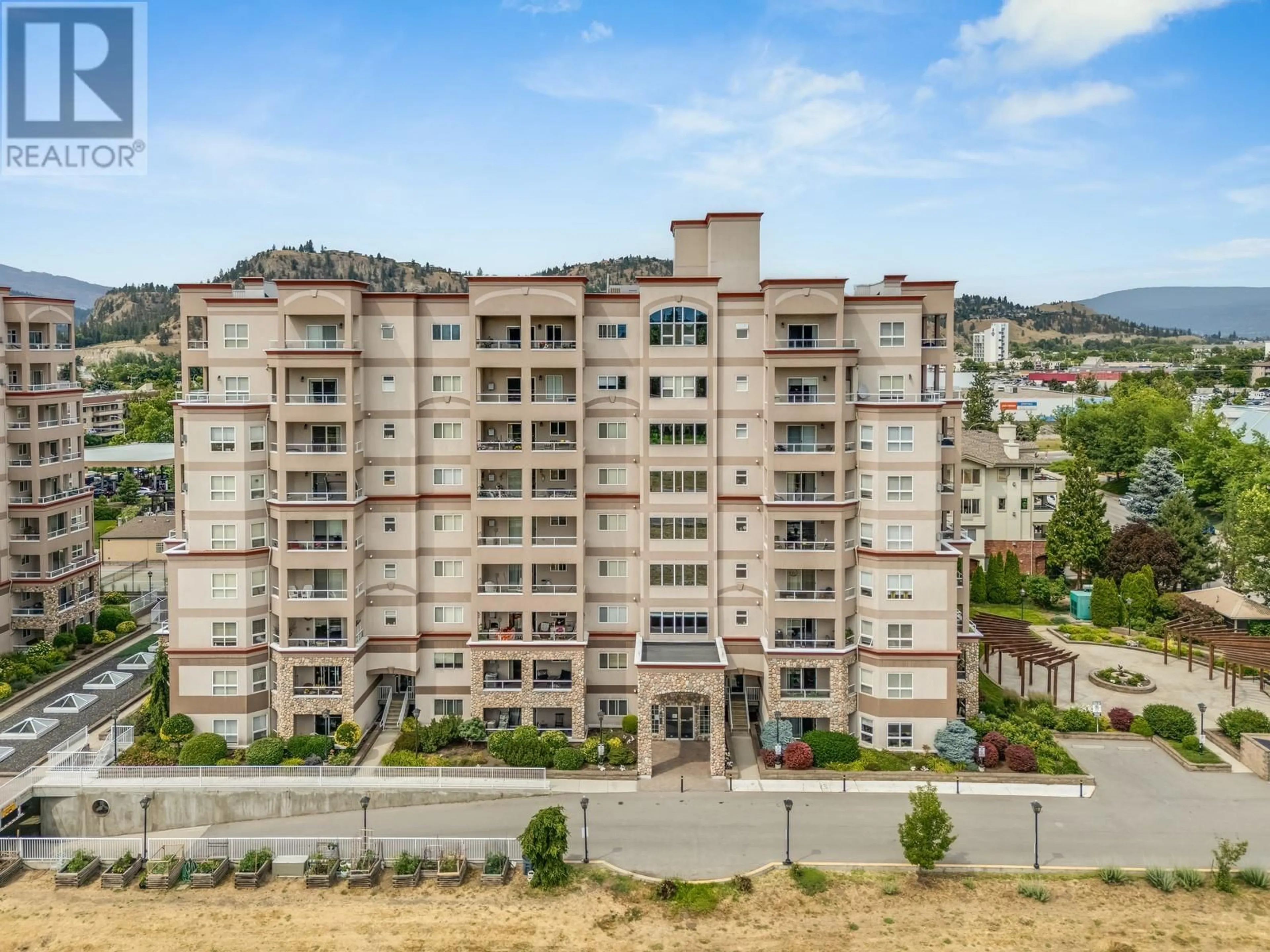 A pic from outside/outdoor area/front of a property/back of a property/a pic from drone, unknown for 302 - 1966 DURNIN ROAD, Kelowna British Columbia V1X7Z2