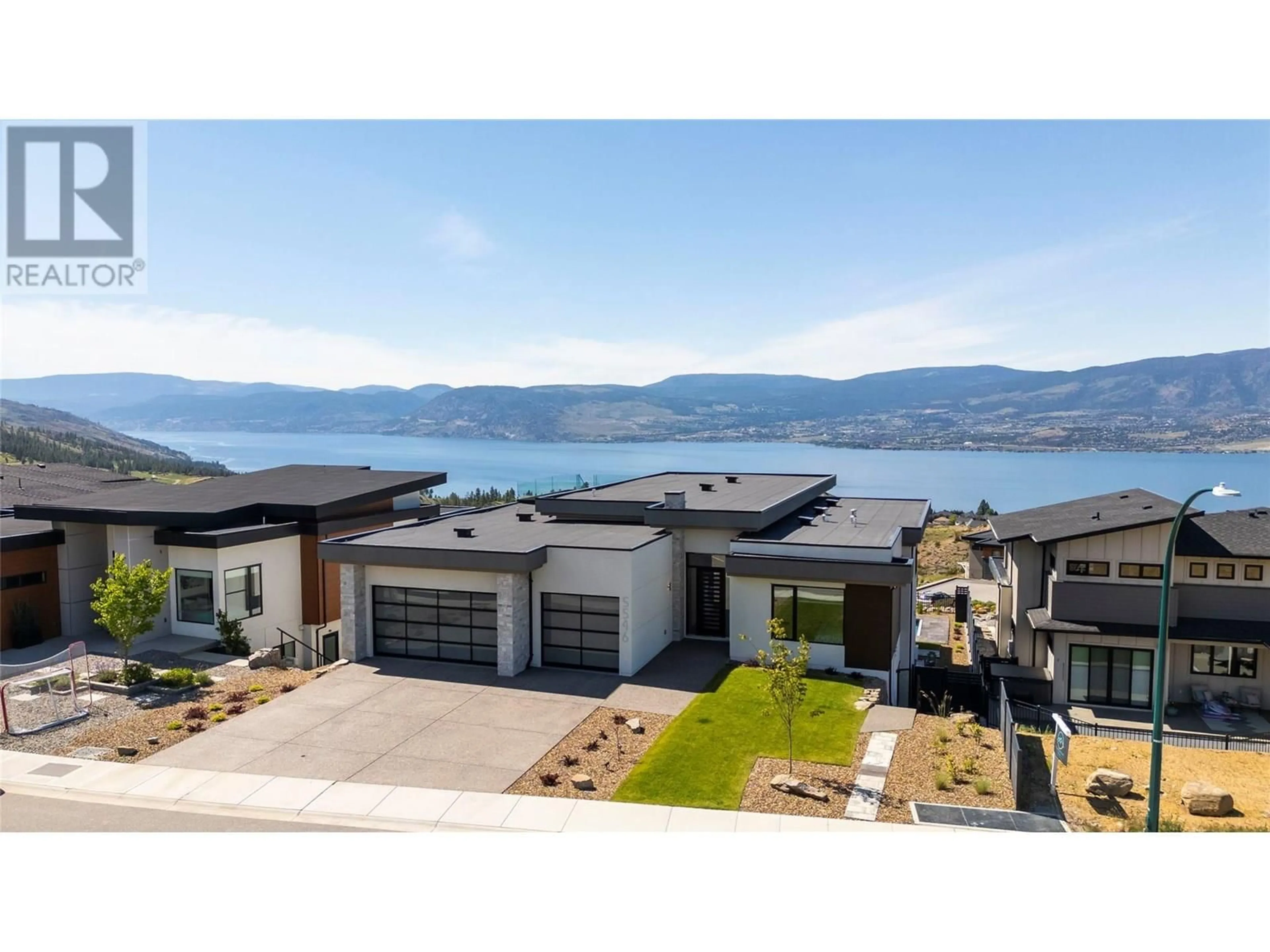 A pic from outside/outdoor area/front of a property/back of a property/a pic from drone, water/lake/river/ocean view for 5546 UPPER MISSION DRIVE, Kelowna British Columbia V1W5M4