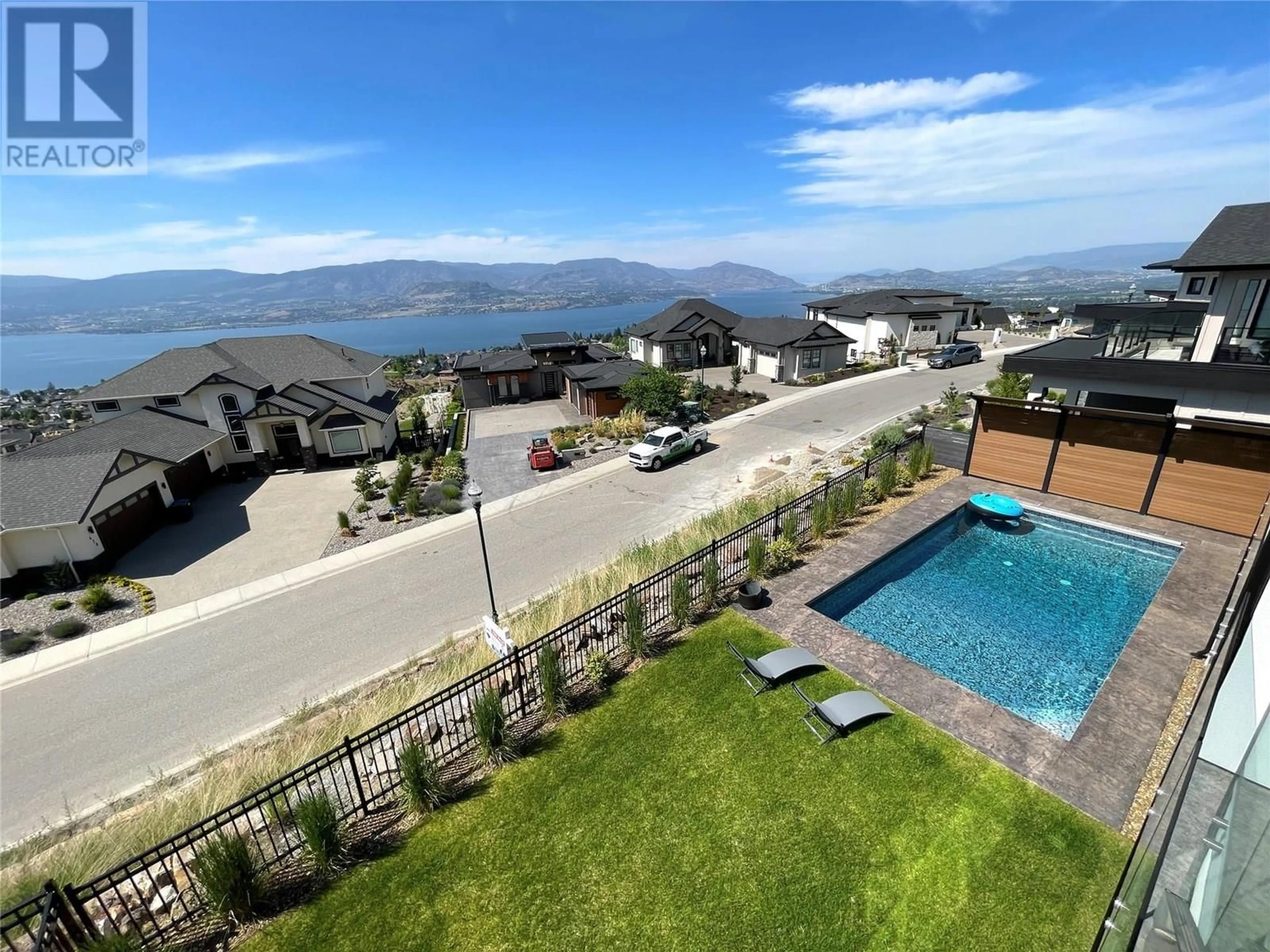 A pic from outside/outdoor area/front of a property/back of a property/a pic from drone, water/lake/river/ocean view for 5546 UPPER MISSION DRIVE, Kelowna British Columbia V1W5M4