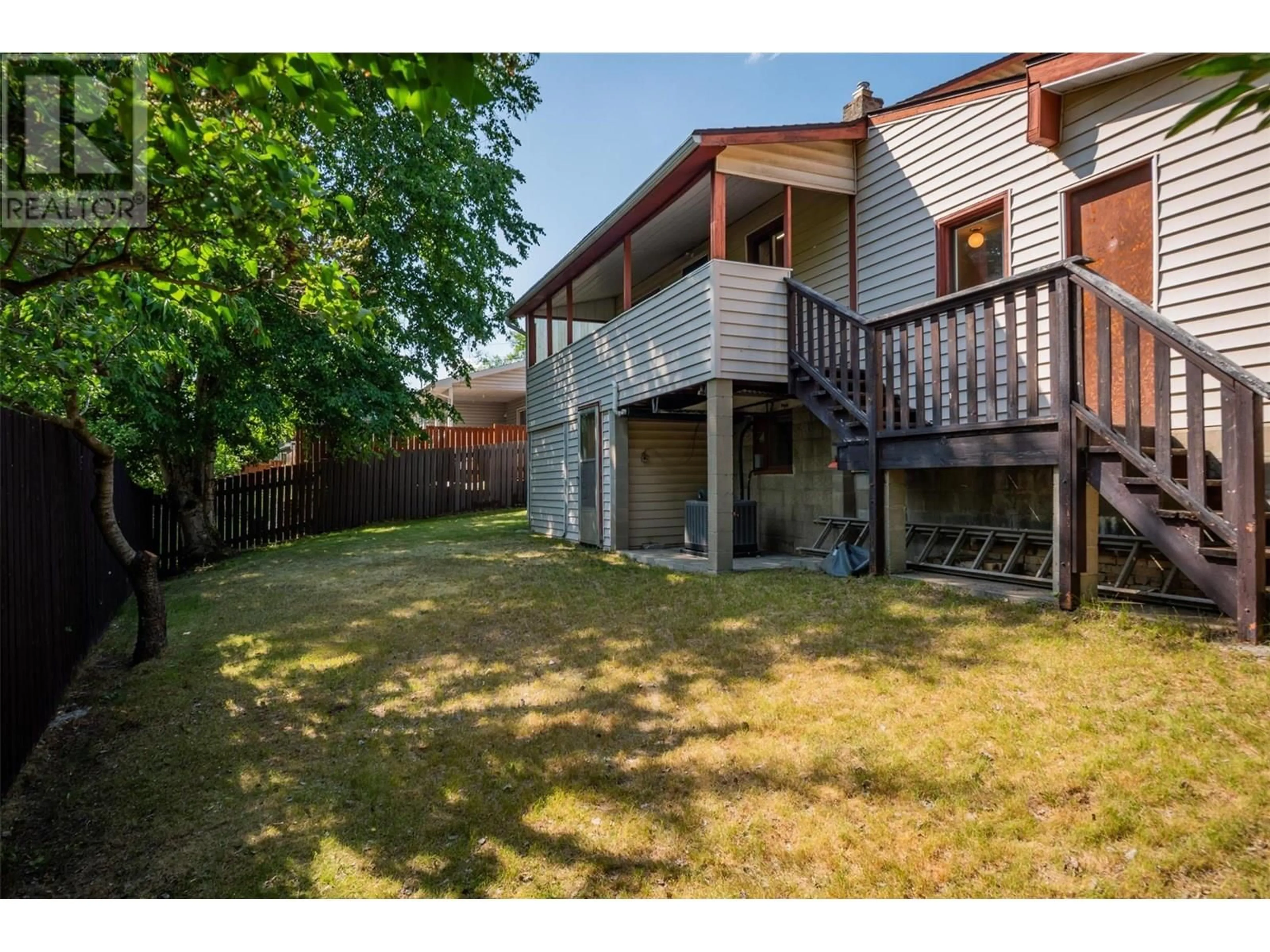 A pic from outside/outdoor area/front of a property/back of a property/a pic from drone, street for 2233 FIFTH AVENUE, Trail British Columbia V1R3E8