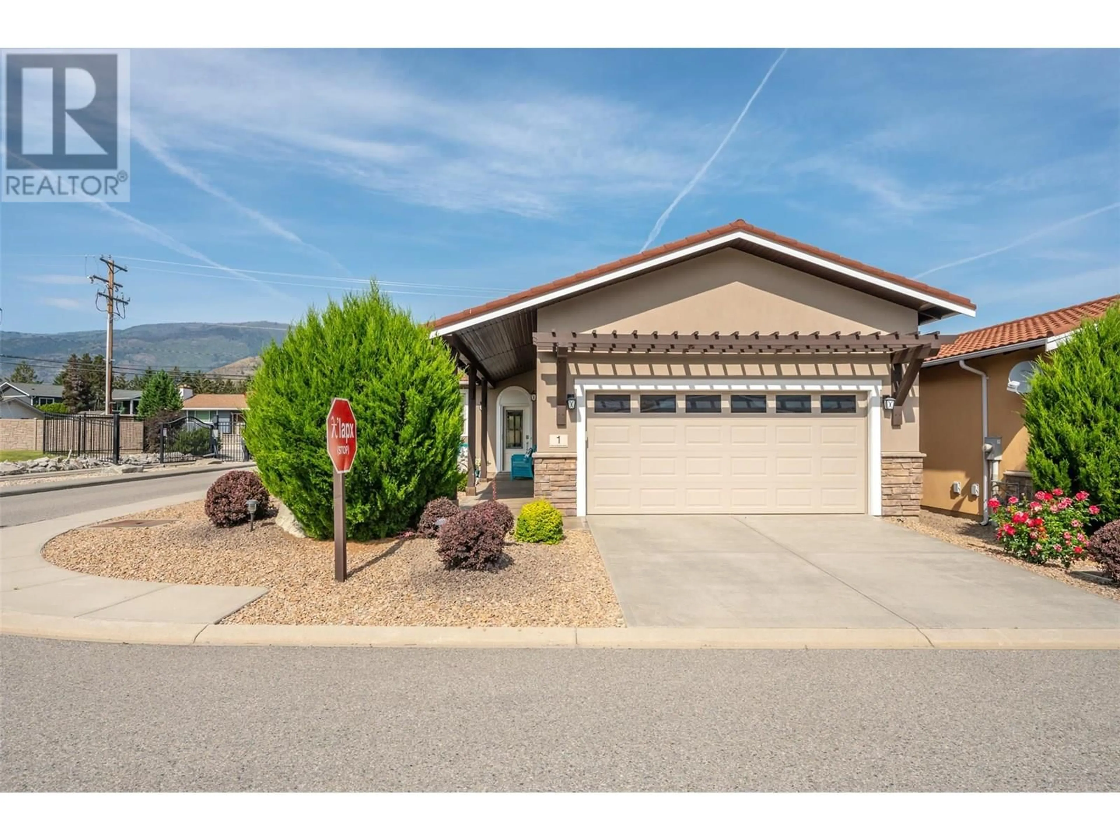 Home with vinyl exterior material, mountain view for 1 - 6823 TUCELNUIT DRIVE, Oliver British Columbia V0H1T2