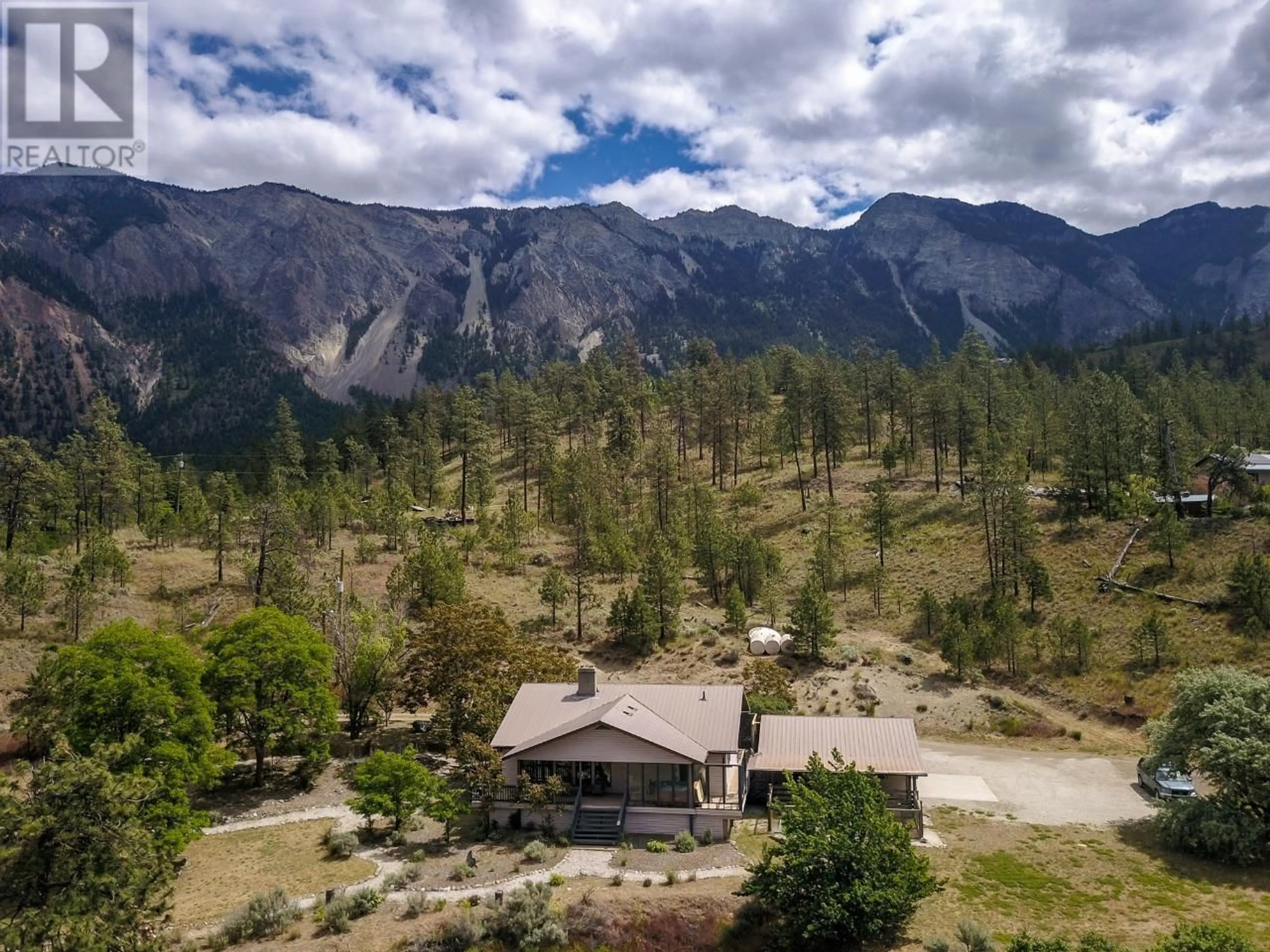 A pic from outside/outdoor area/front of a property/back of a property/a pic from drone, mountain view for 102 PINE RIDGE ROAD, Lillooet British Columbia V0K1V0