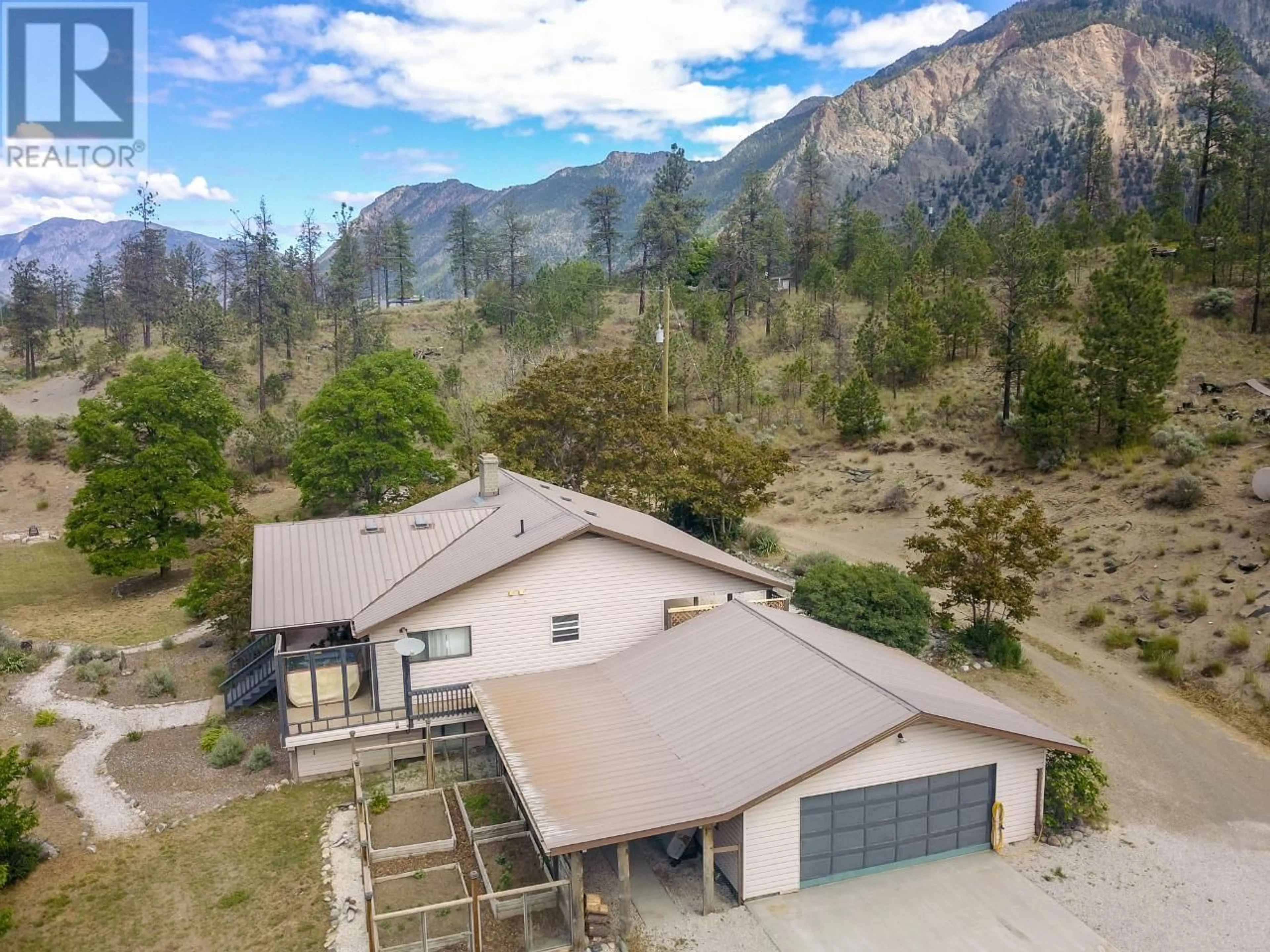 A pic from outside/outdoor area/front of a property/back of a property/a pic from drone, mountain view for 102 PINE RIDGE ROAD, Lillooet British Columbia V0K1V0