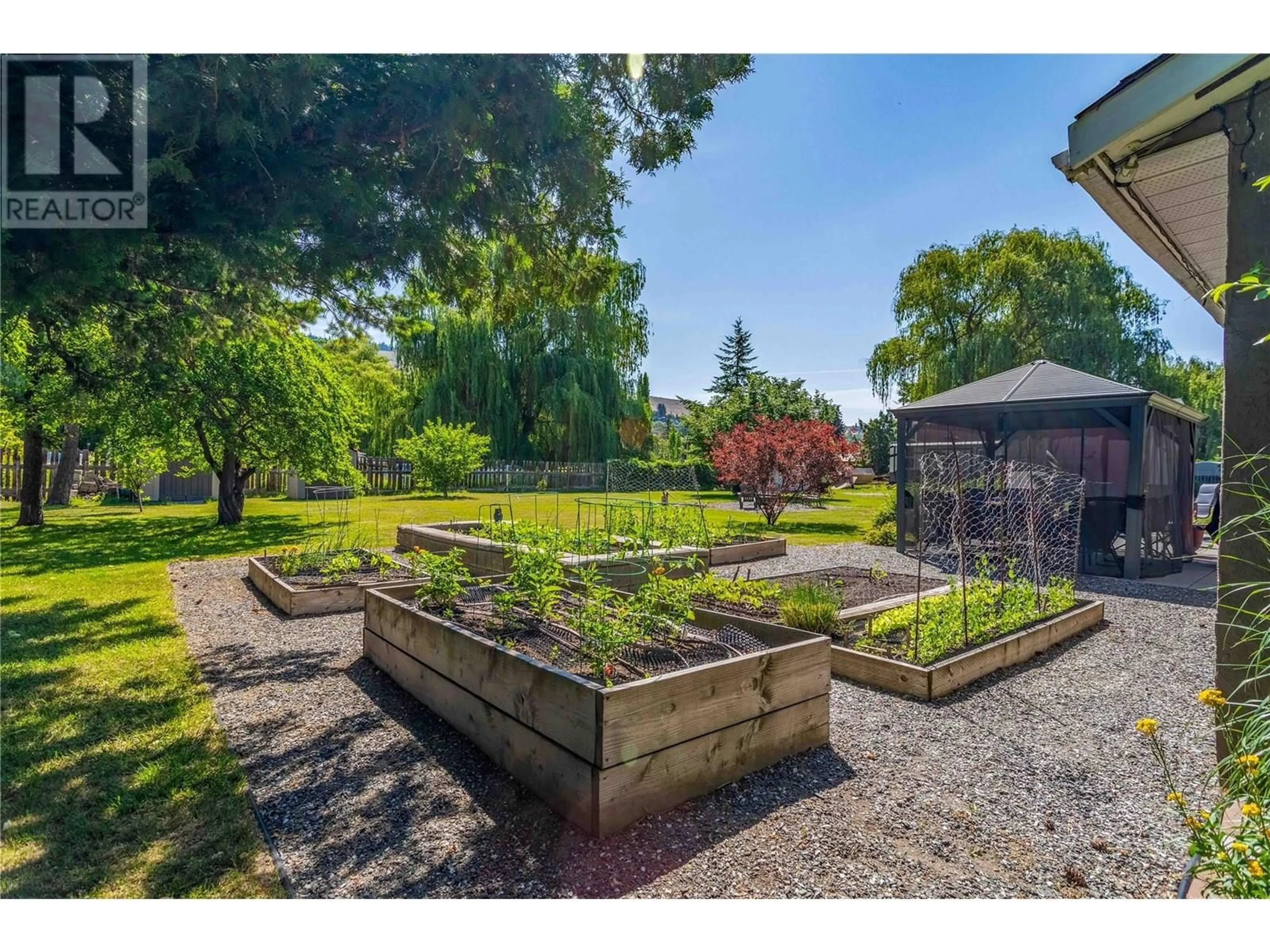 A pic from outside/outdoor area/front of a property/back of a property/a pic from drone, street for 11441 REISWIG ROAD, Lake Country British Columbia V4V1Y5