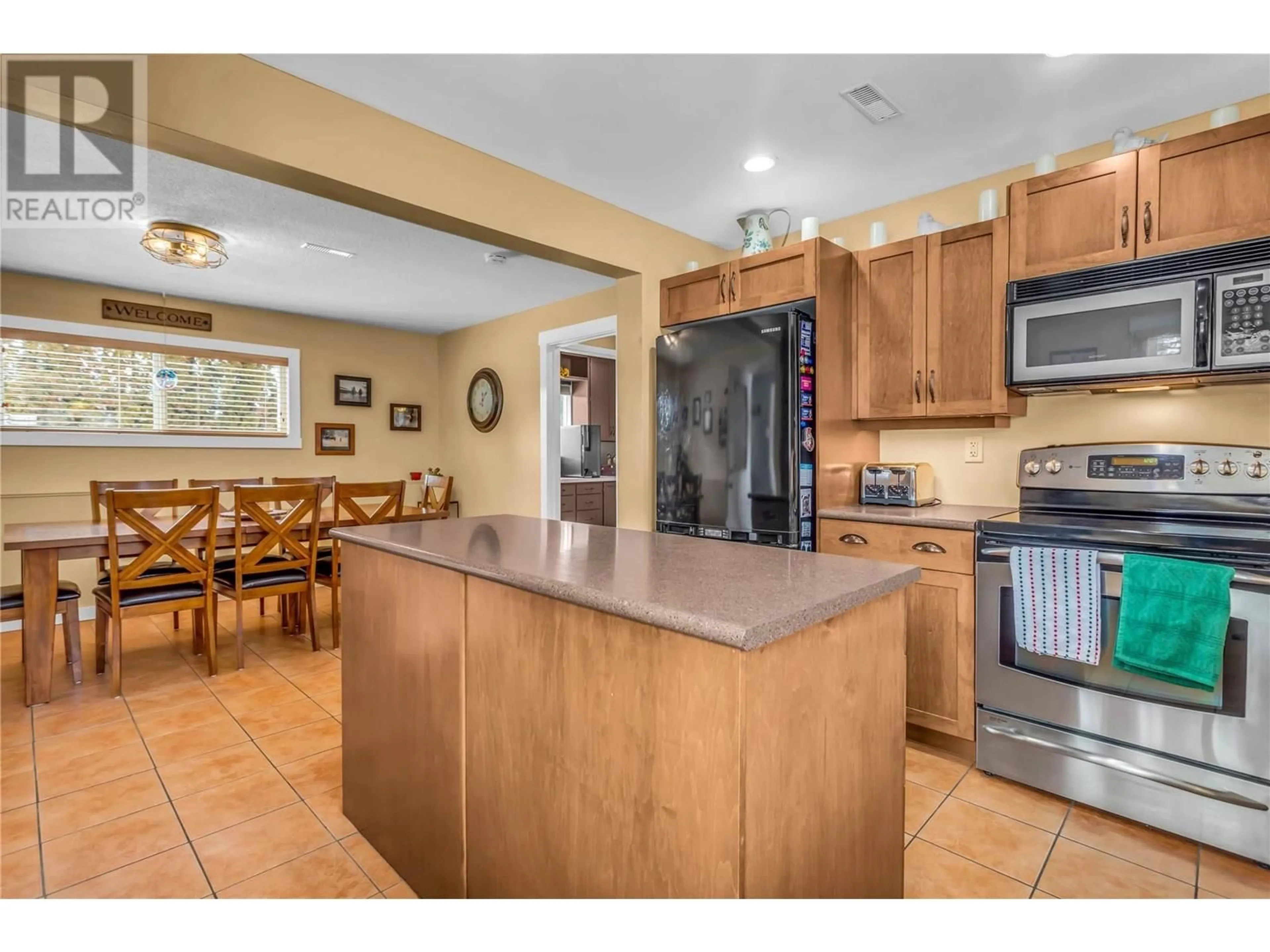 Open concept kitchen, ceramic/tile floor for 11441 REISWIG ROAD, Lake Country British Columbia V4V1Y5