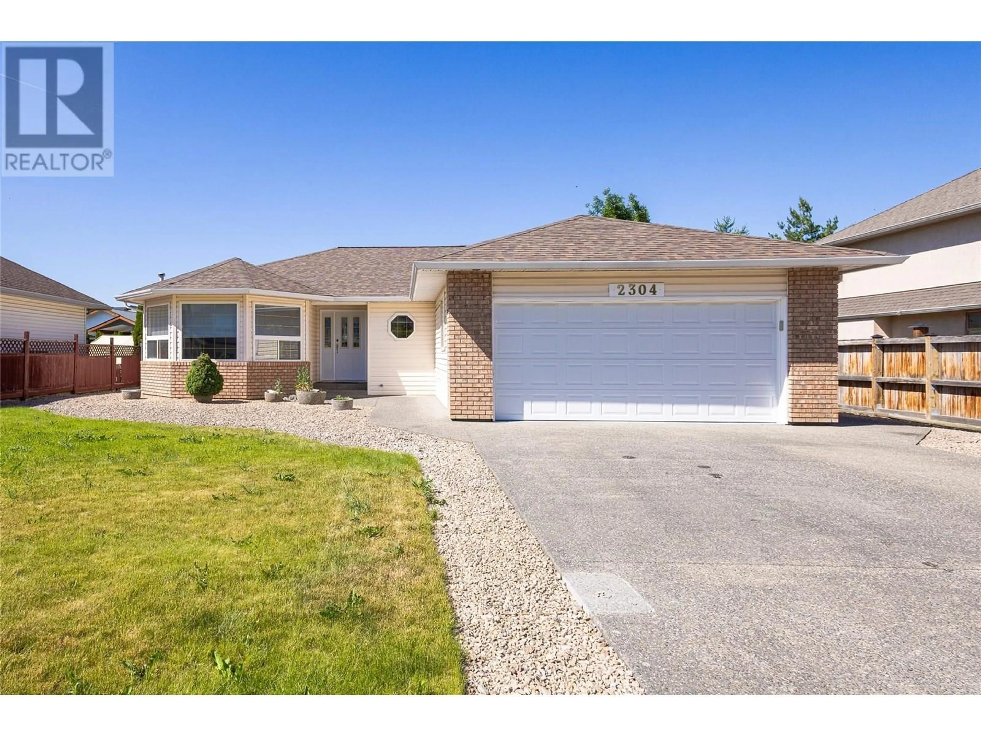 Home with brick exterior material, street for 2304 BRADLEY DRIVE, Armstrong British Columbia V0E1B1