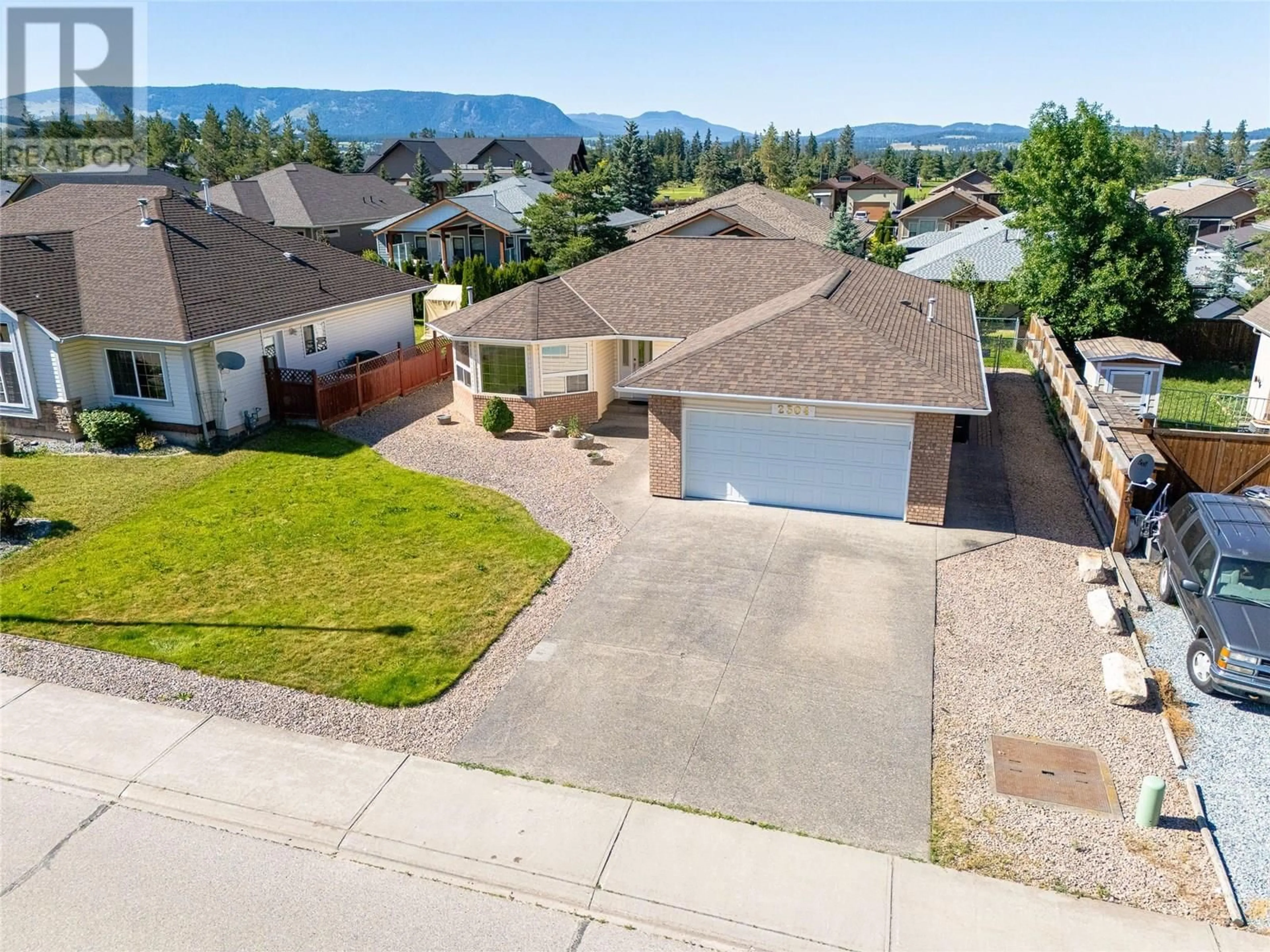 A pic from outside/outdoor area/front of a property/back of a property/a pic from drone, street for 2304 BRADLEY DRIVE, Armstrong British Columbia V0E1B1