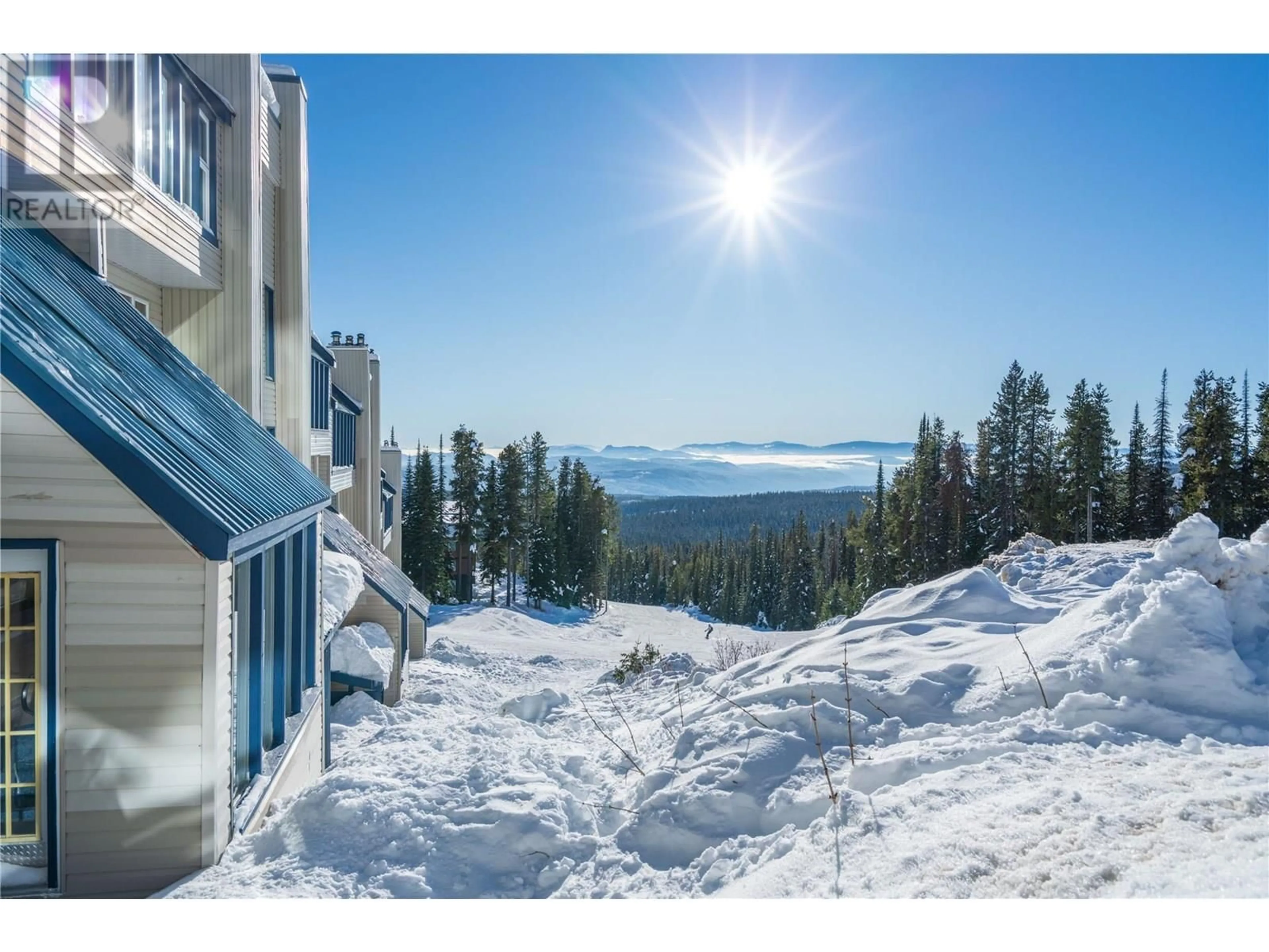 A pic from outside/outdoor area/front of a property/back of a property/a pic from drone, mountain view for B6 - 7375 PORCUPINE ROAD, Big White British Columbia V1P1P3
