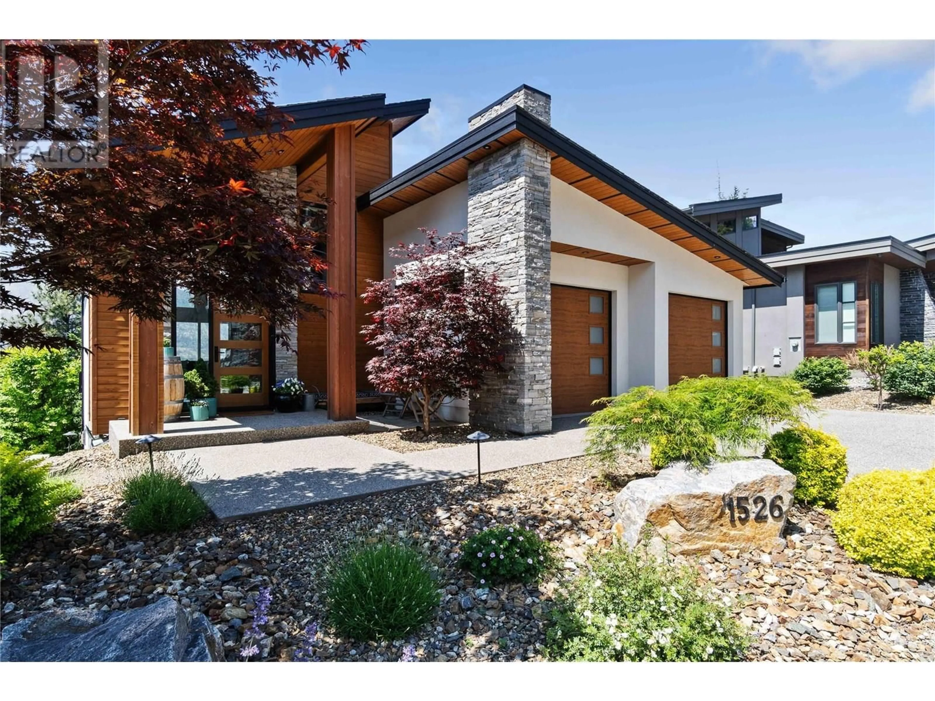 Home with brick exterior material, street for 1526 MARBLE LEDGE DRIVE, Lake Country British Columbia V4V2T4