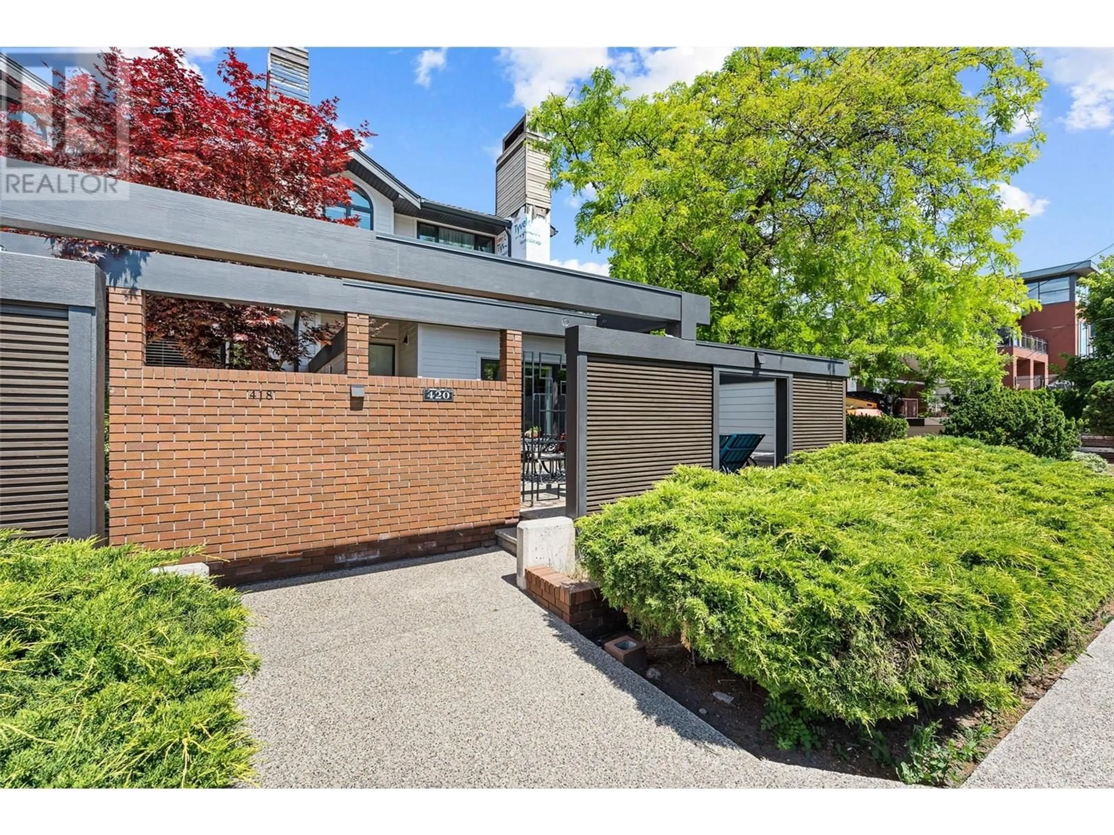 Home with brick exterior material, street for 420 WEST AVENUE, Kelowna British Columbia V1Y4Z2