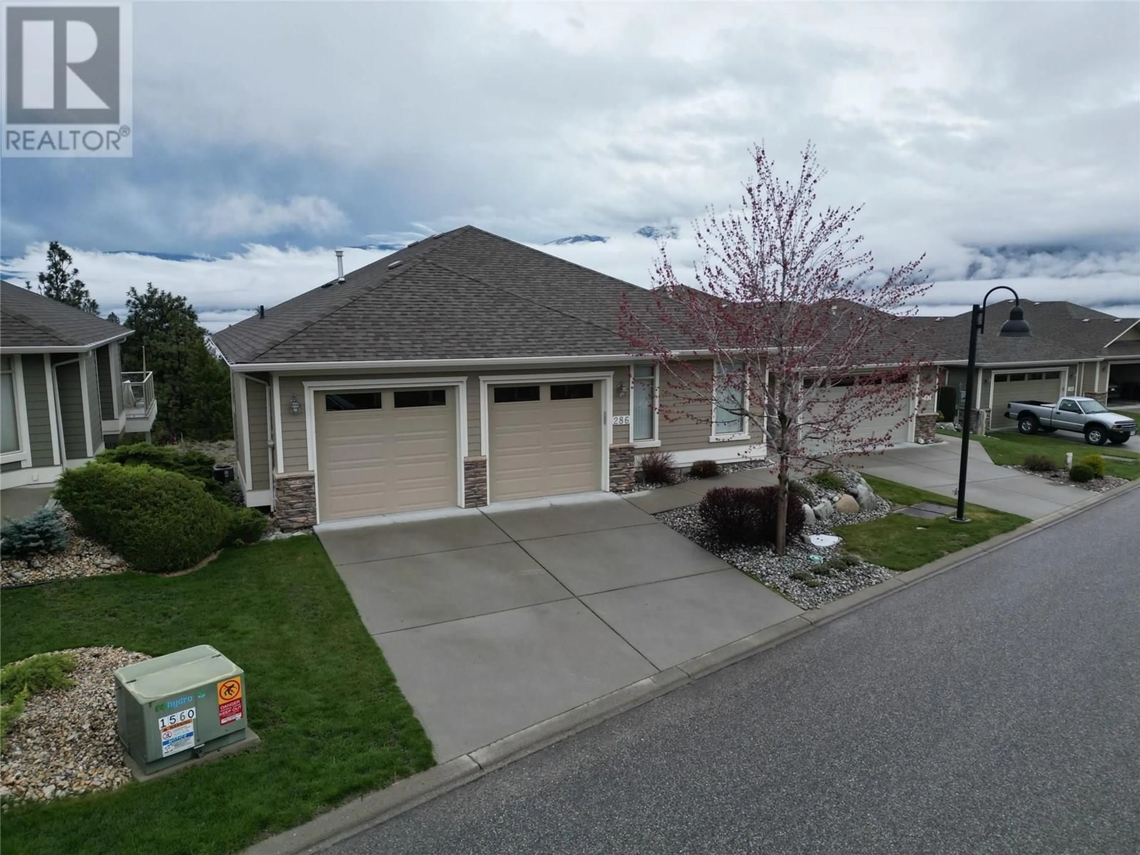 A pic from outside/outdoor area/front of a property/back of a property/a pic from drone, street for 286 - 4035 GELLATLY ROAD, West Kelowna British Columbia V4T1R7
