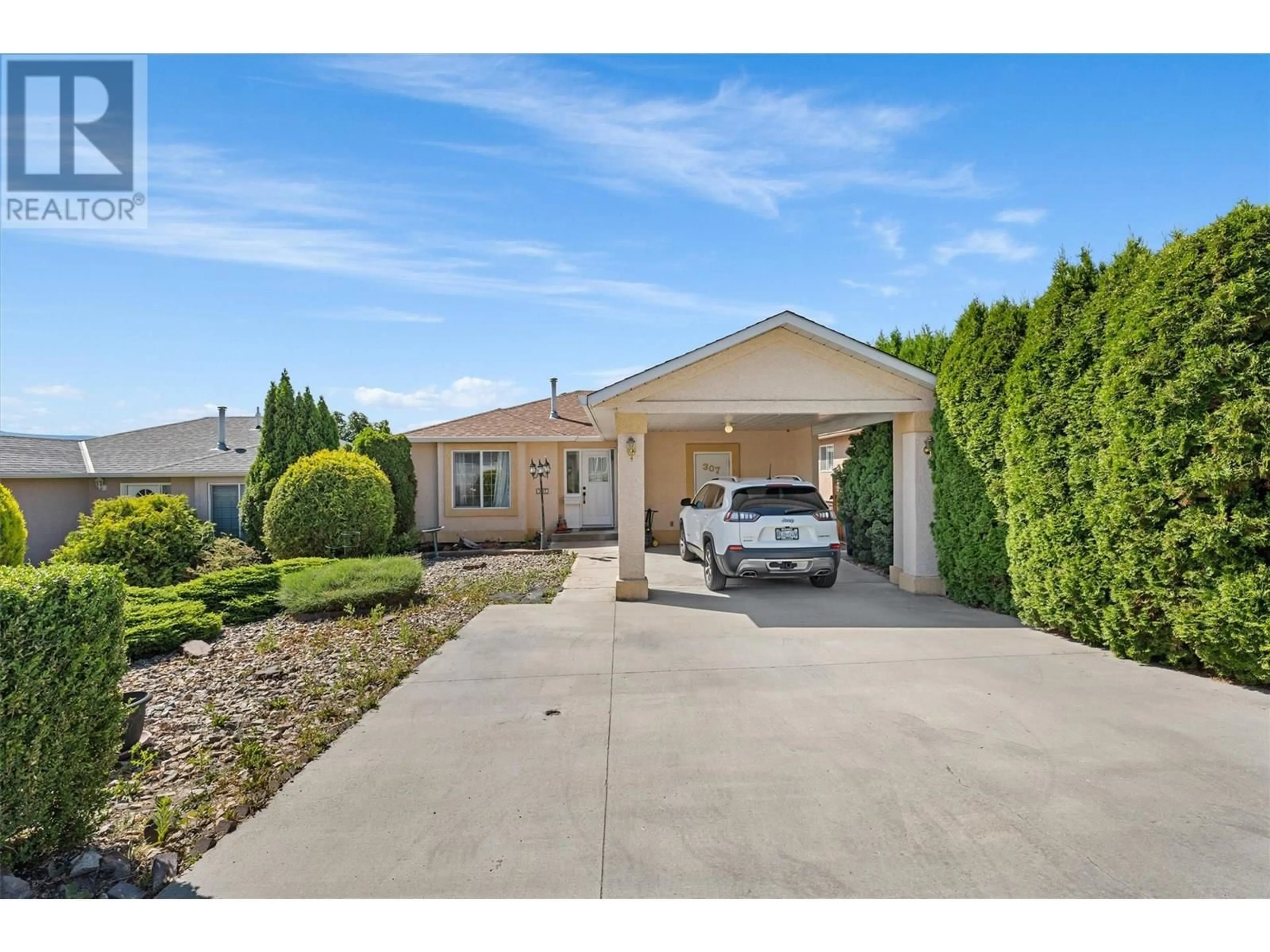 A pic from outside/outdoor area/front of a property/back of a property/a pic from drone, street for 307 - 2440 OLD OKANAGAN HIGHWAY, West Kelowna British Columbia V4T1X6