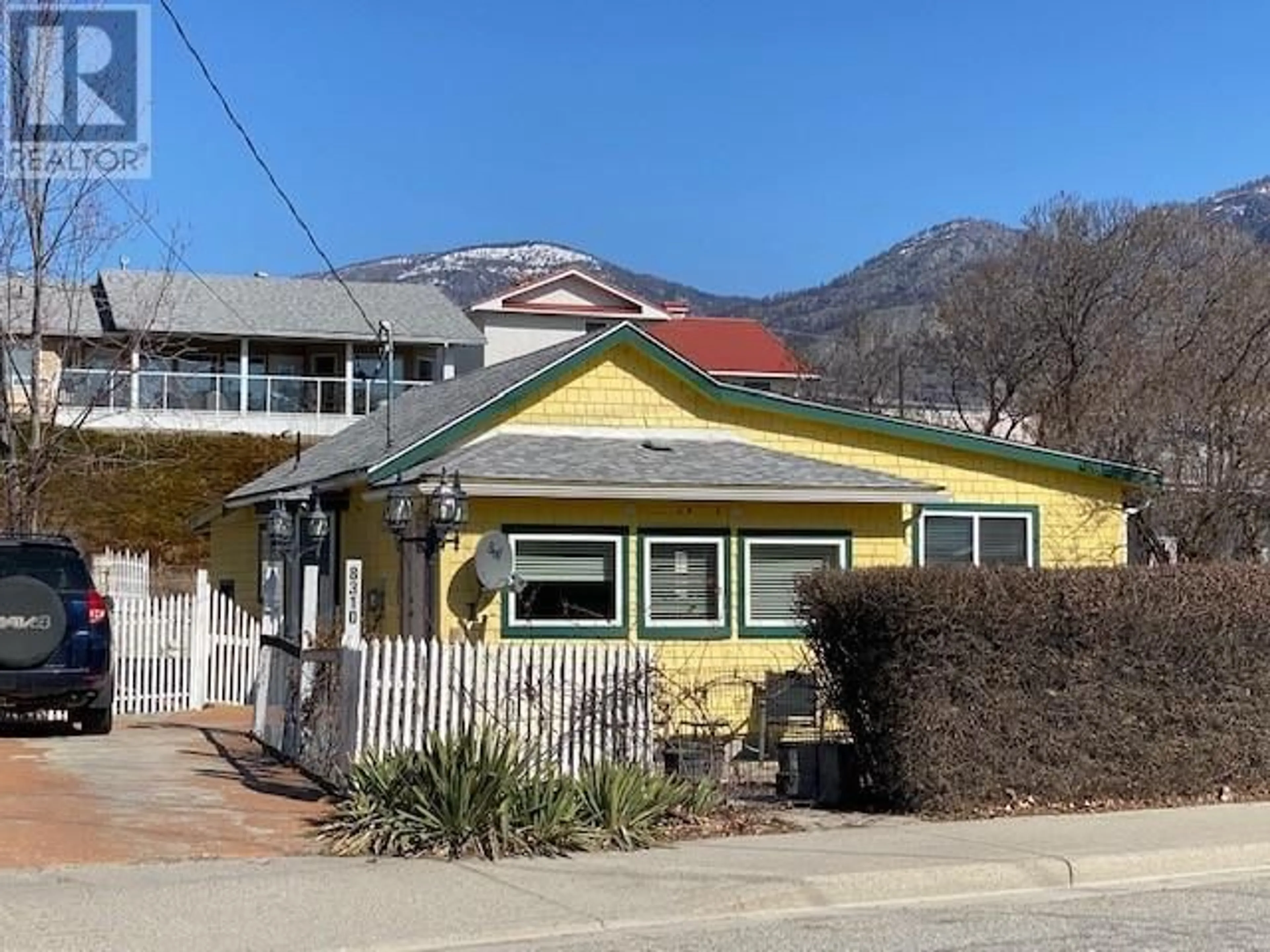 A pic from outside/outdoor area/front of a property/back of a property/a pic from drone, mountain view for 8310 KINGFISHER DRIVE, Osoyoos British Columbia V0H1V1