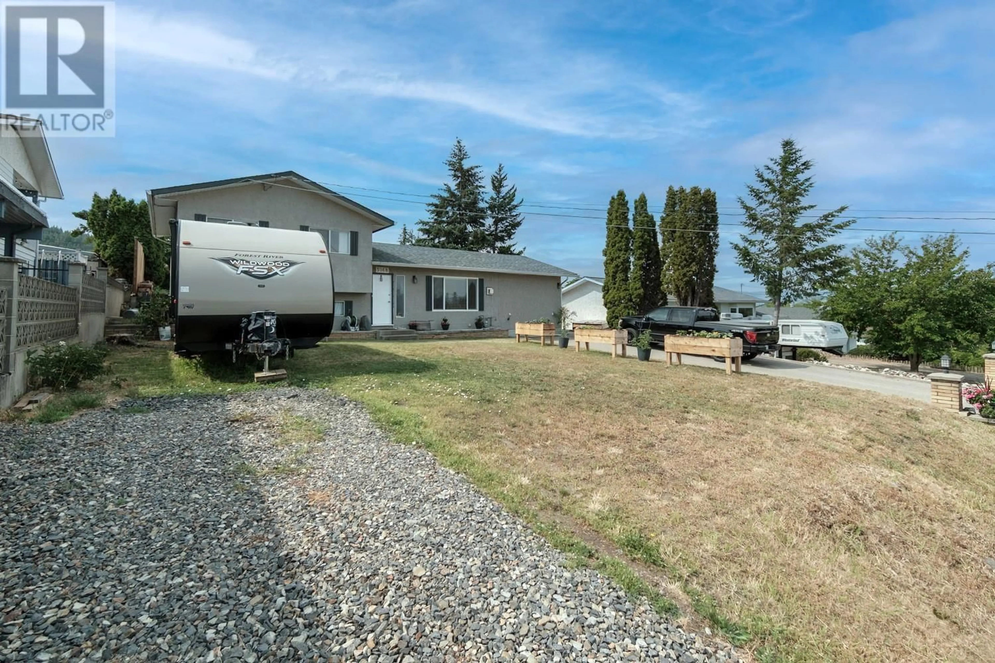 A pic from outside/outdoor area/front of a property/back of a property/a pic from drone, unknown for 5168 HAYNES ROAD, Vernon British Columbia V1B3J6