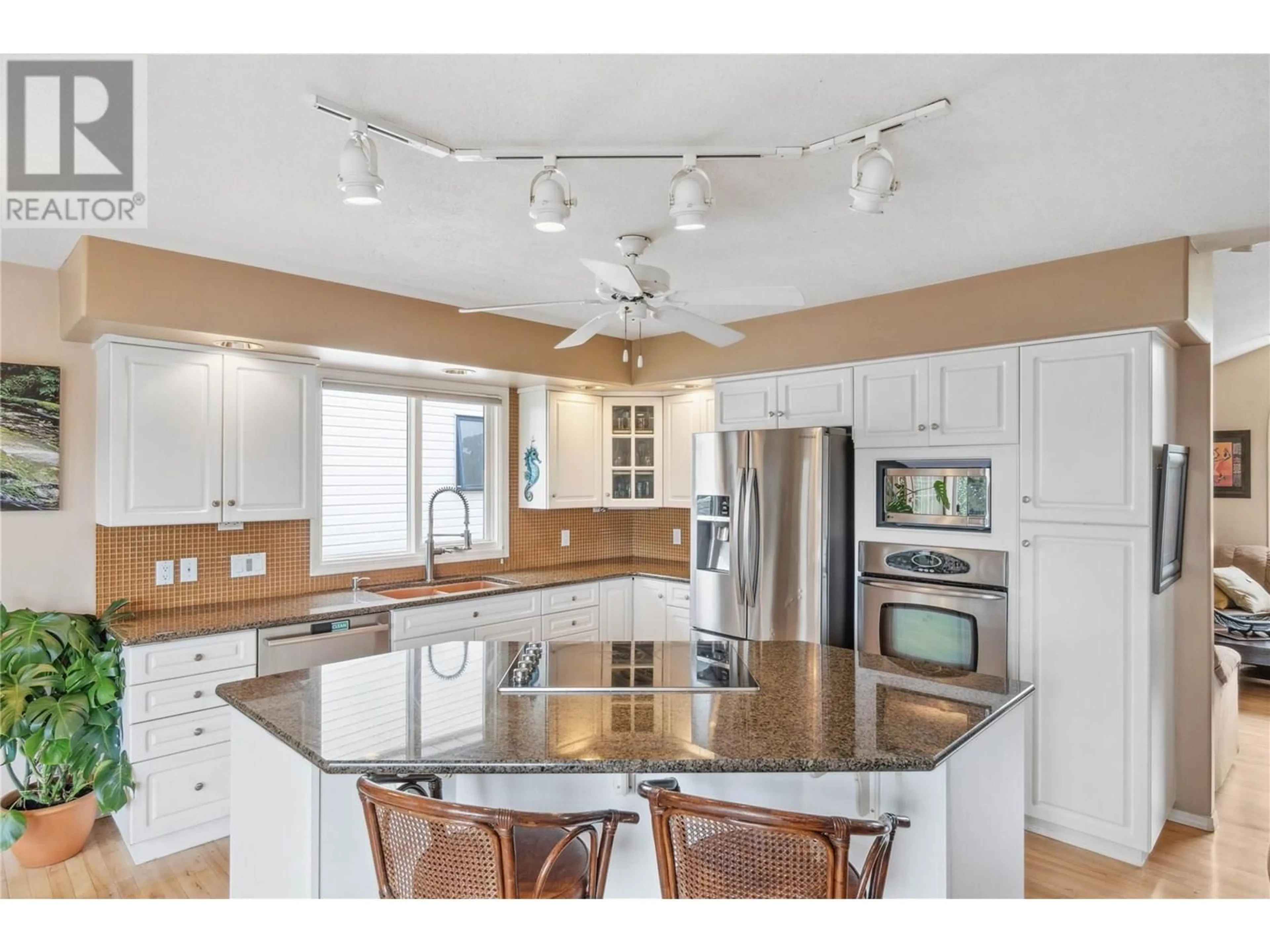Open concept kitchen, ceramic/tile floor for 1840 MCKINLEY COURT, Kamloops British Columbia V2E2L9