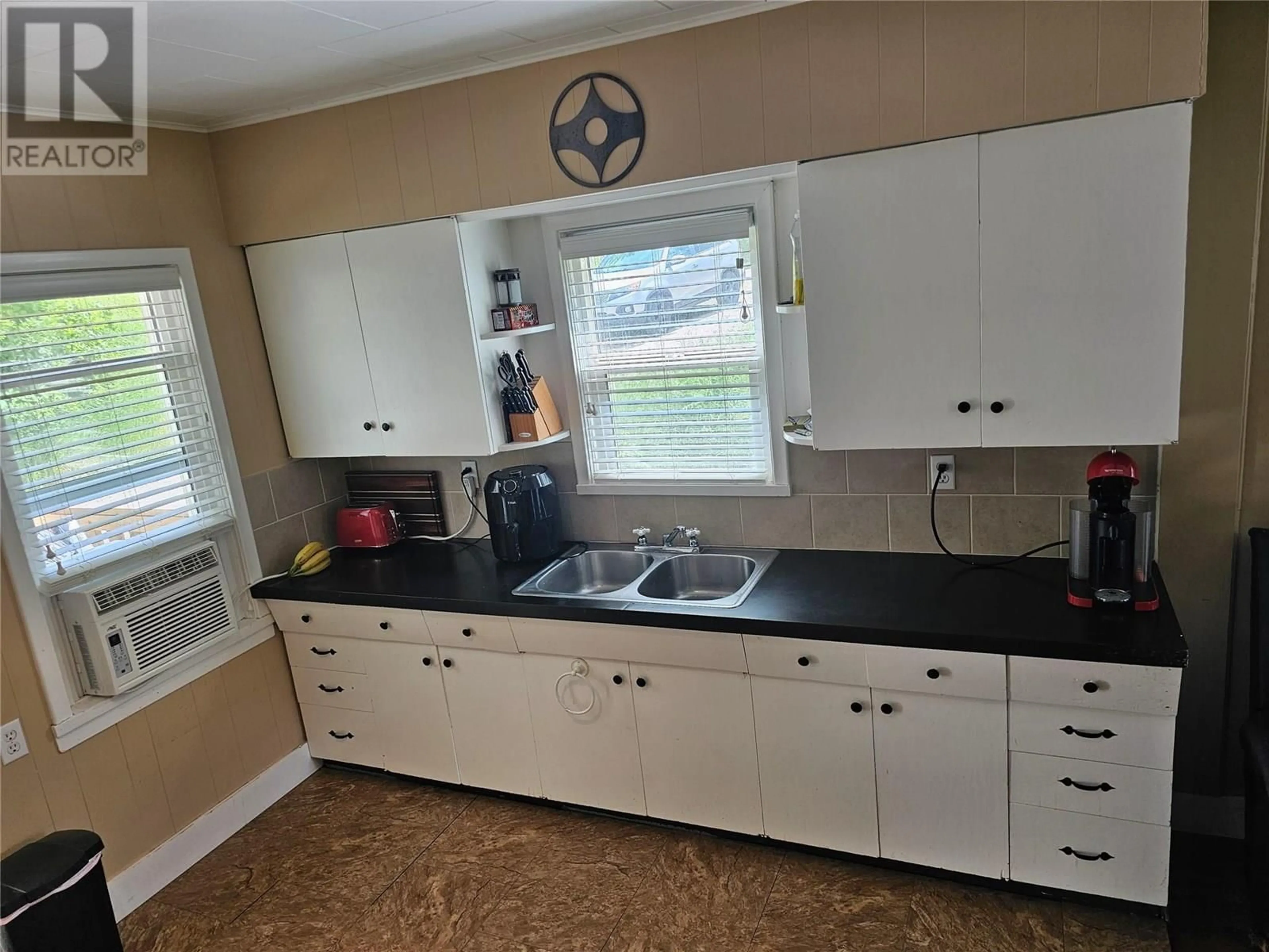 Standard kitchen, ceramic/tile floor for 5707 KHADIKIN ROAD, Taghum British Columbia V1L6Y2
