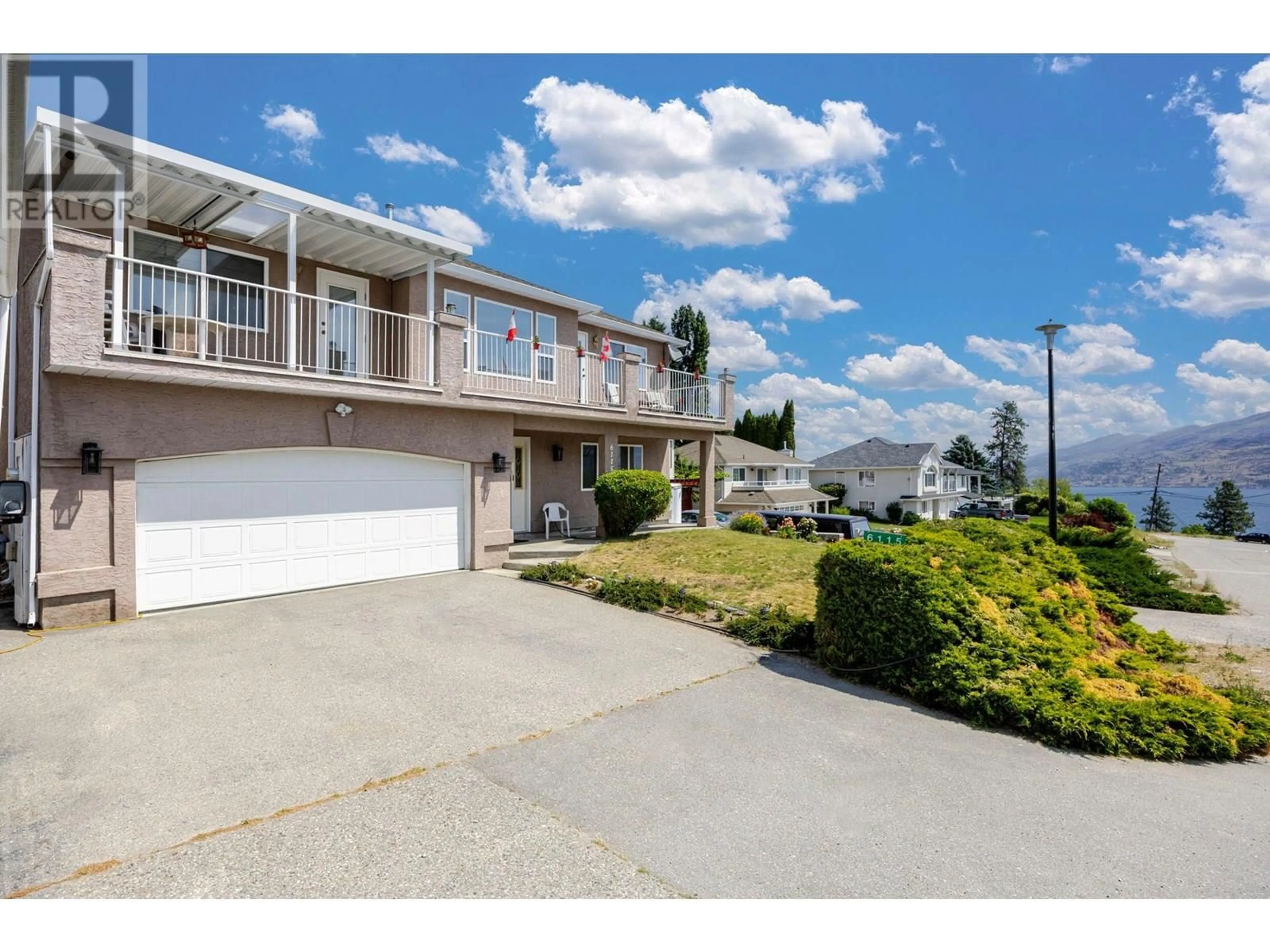 A pic from outside/outdoor area/front of a property/back of a property/a pic from drone, water/lake/river/ocean view for 6115 AITKENS ROAD, Peachland British Columbia V0H1X7