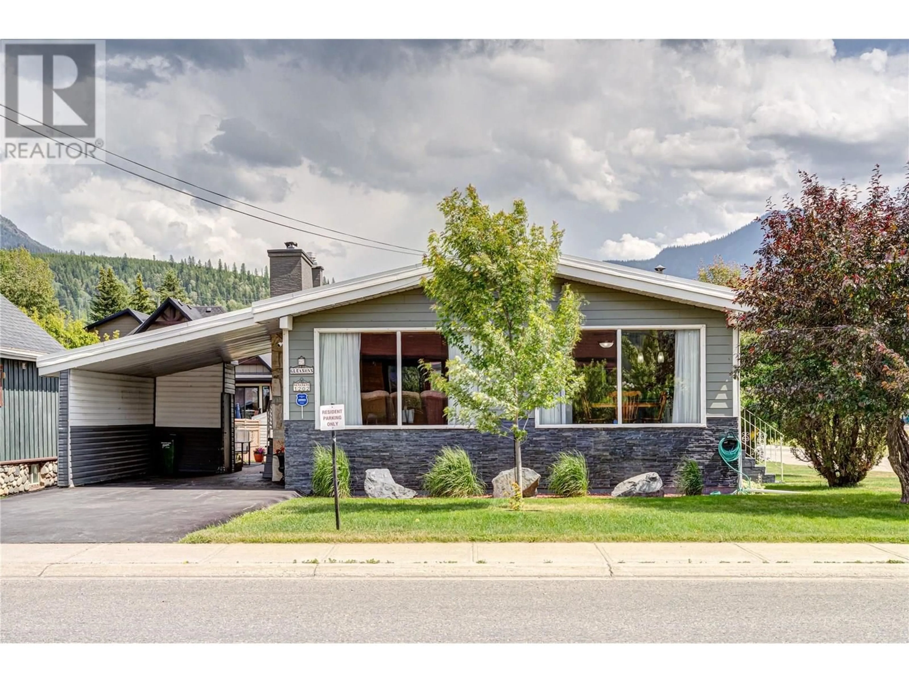 Home with vinyl exterior material, street for 1202 6TH AVENUE, Fernie British Columbia V0B1M0