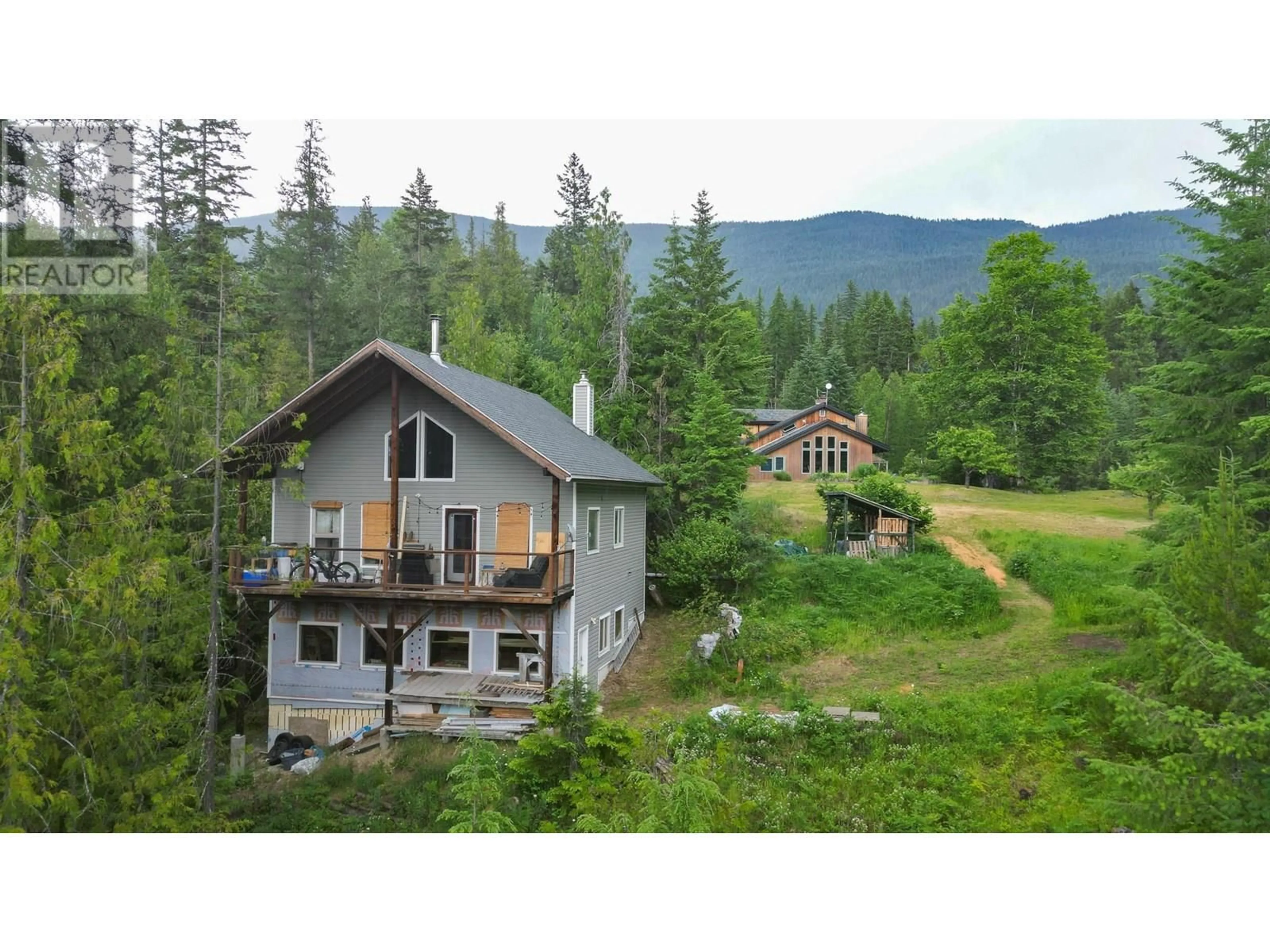 A pic from outside/outdoor area/front of a property/back of a property/a pic from drone, mountain view for 912 RIONDEL ROAD, Riondel British Columbia V0B2B0