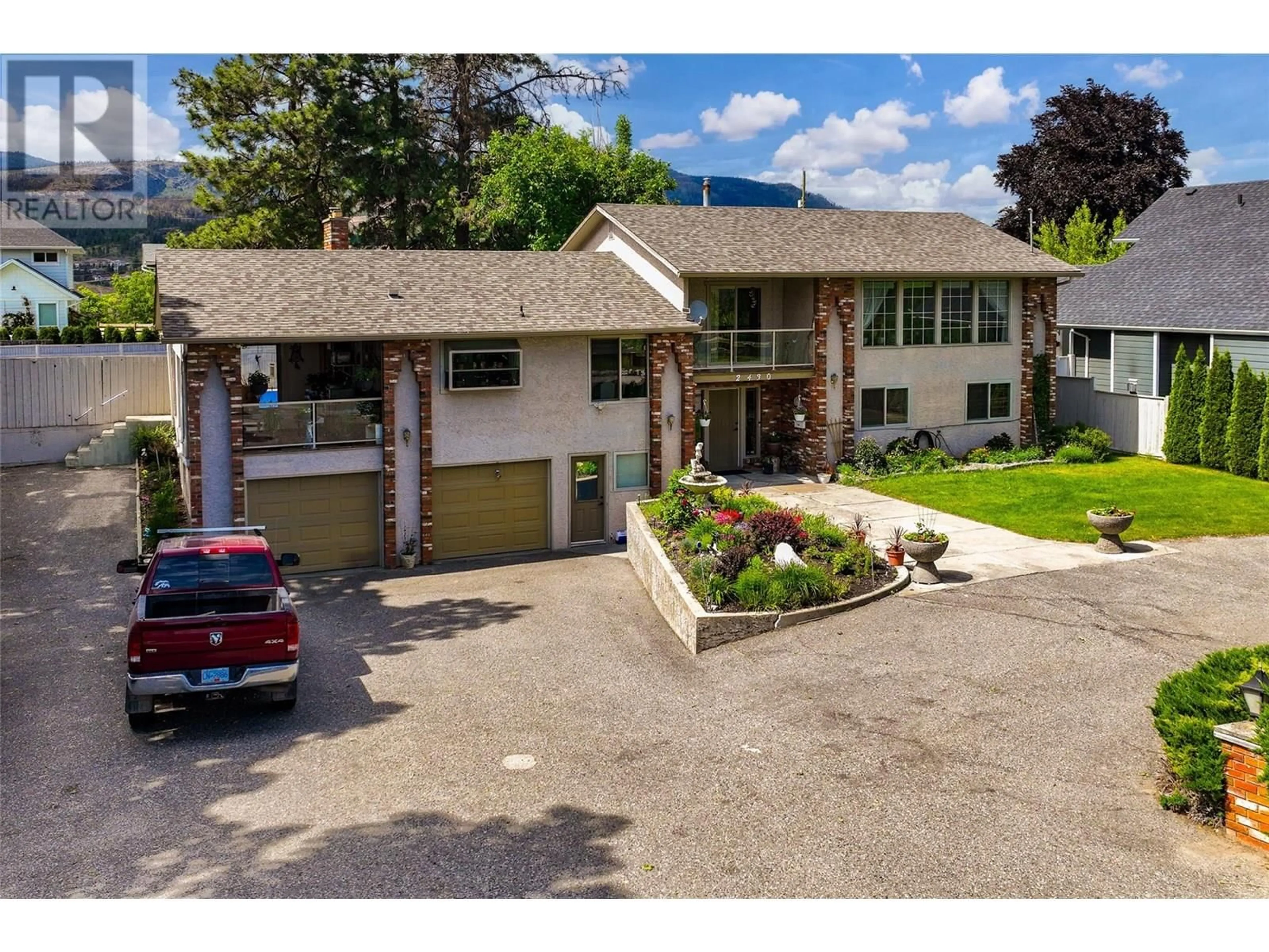 A pic from outside/outdoor area/front of a property/back of a property/a pic from drone, mountain view for 2430 CRESTVIEW ROAD, West Kelowna British Columbia V1Z1Z1