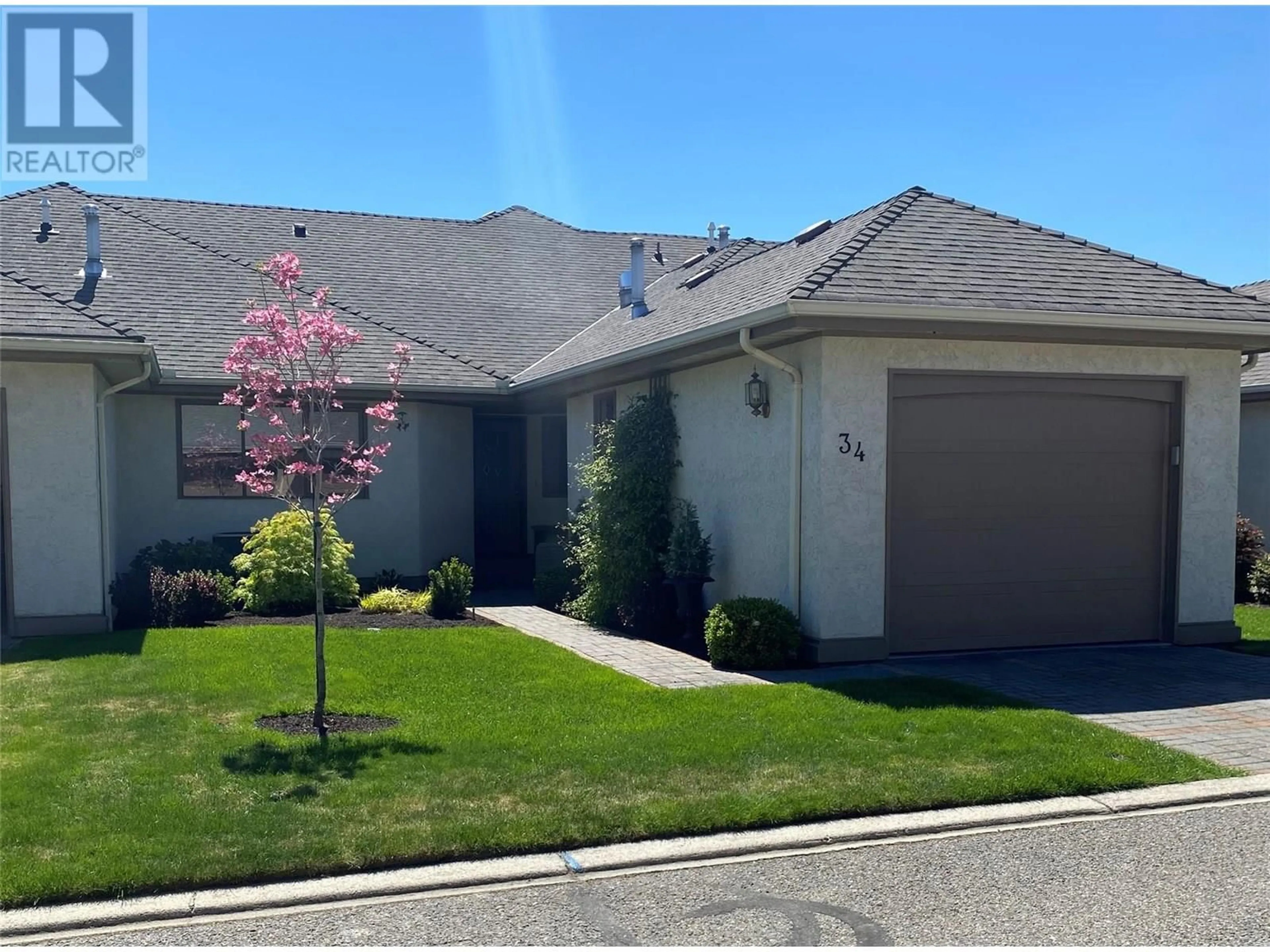 Home with vinyl exterior material, street for 34 - 950 LANFRANCO ROAD, Kelowna British Columbia V1W3W8