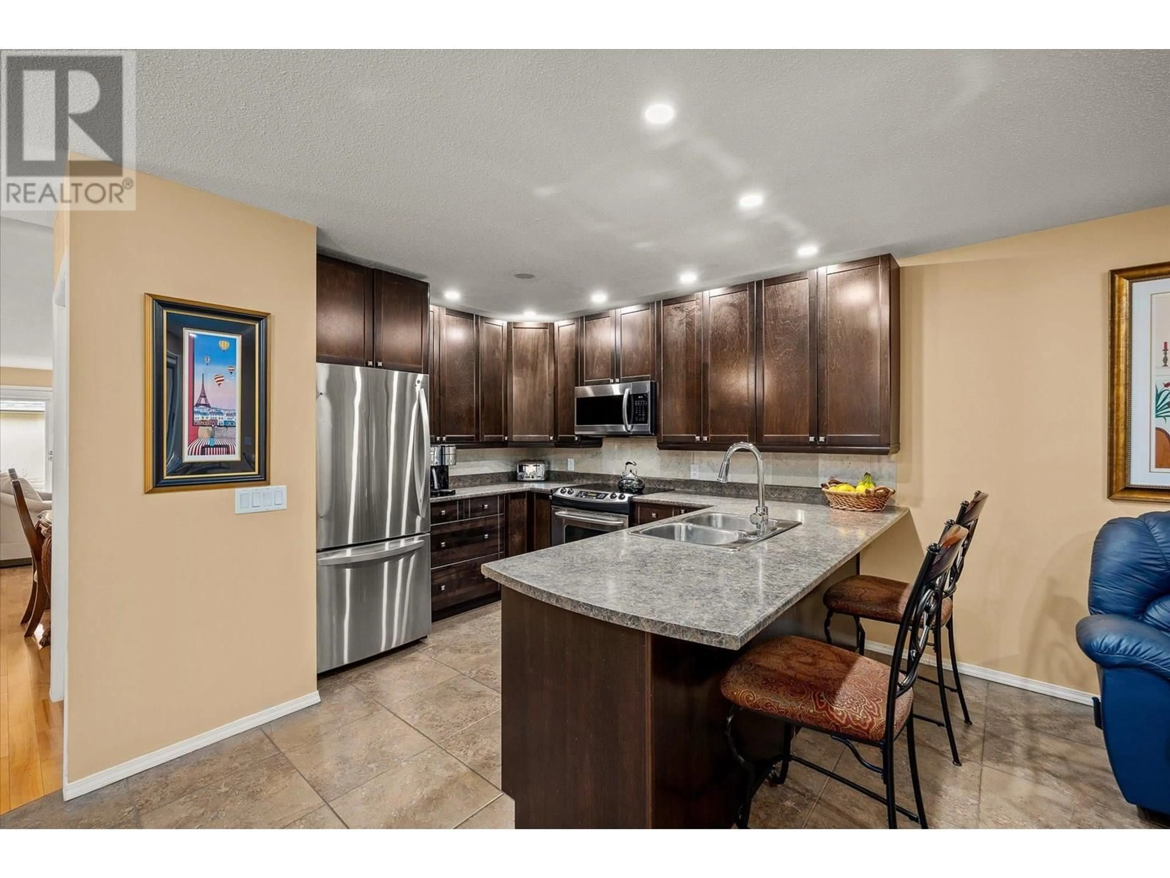 Open concept kitchen, ceramic/tile floor for 34 - 950 LANFRANCO ROAD, Kelowna British Columbia V1W3W8
