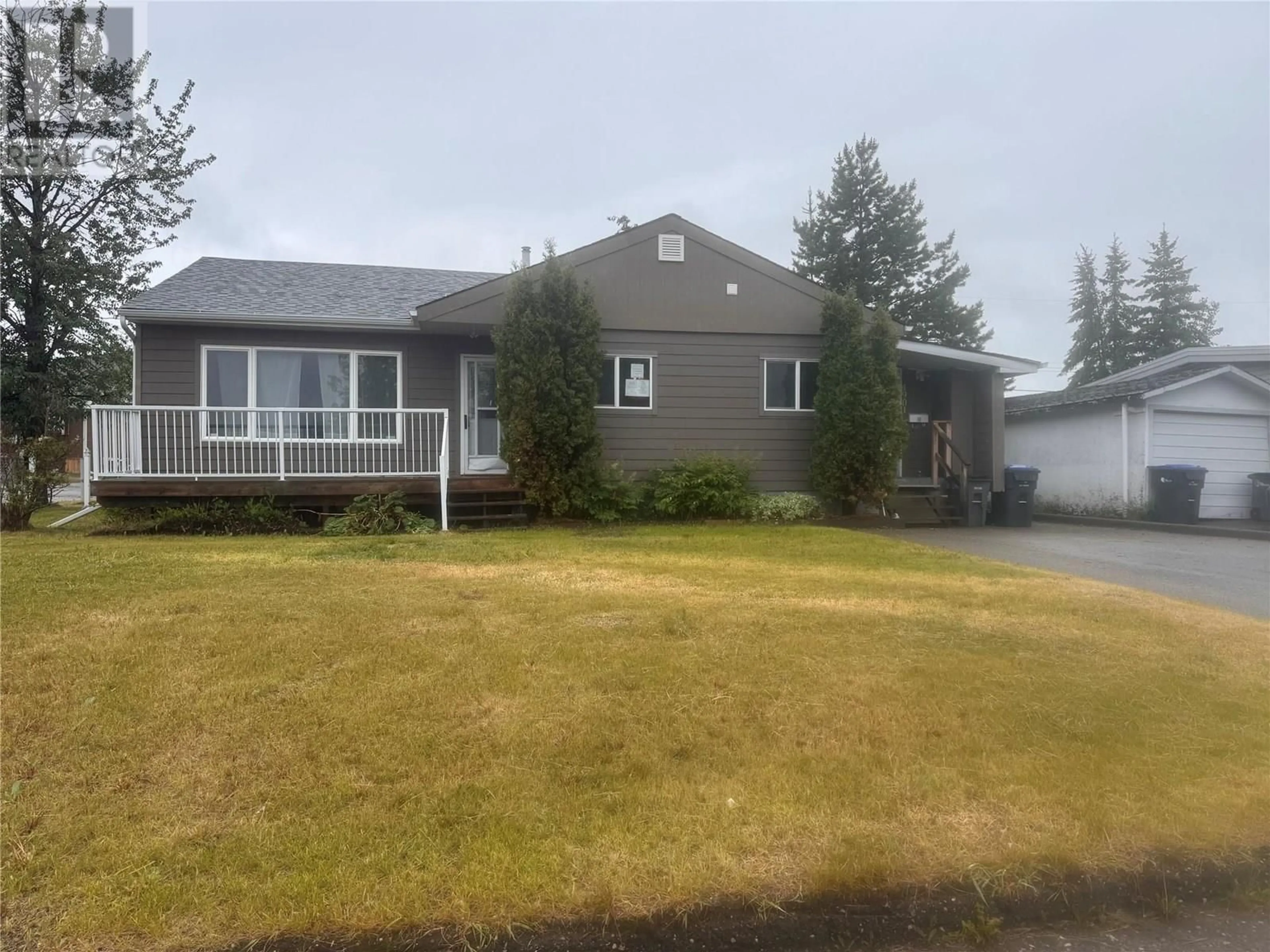 A pic from outside/outdoor area/front of a property/back of a property/a pic from drone, street for 1901 109 AVENUE, Dawson Creek British Columbia V1G2V8