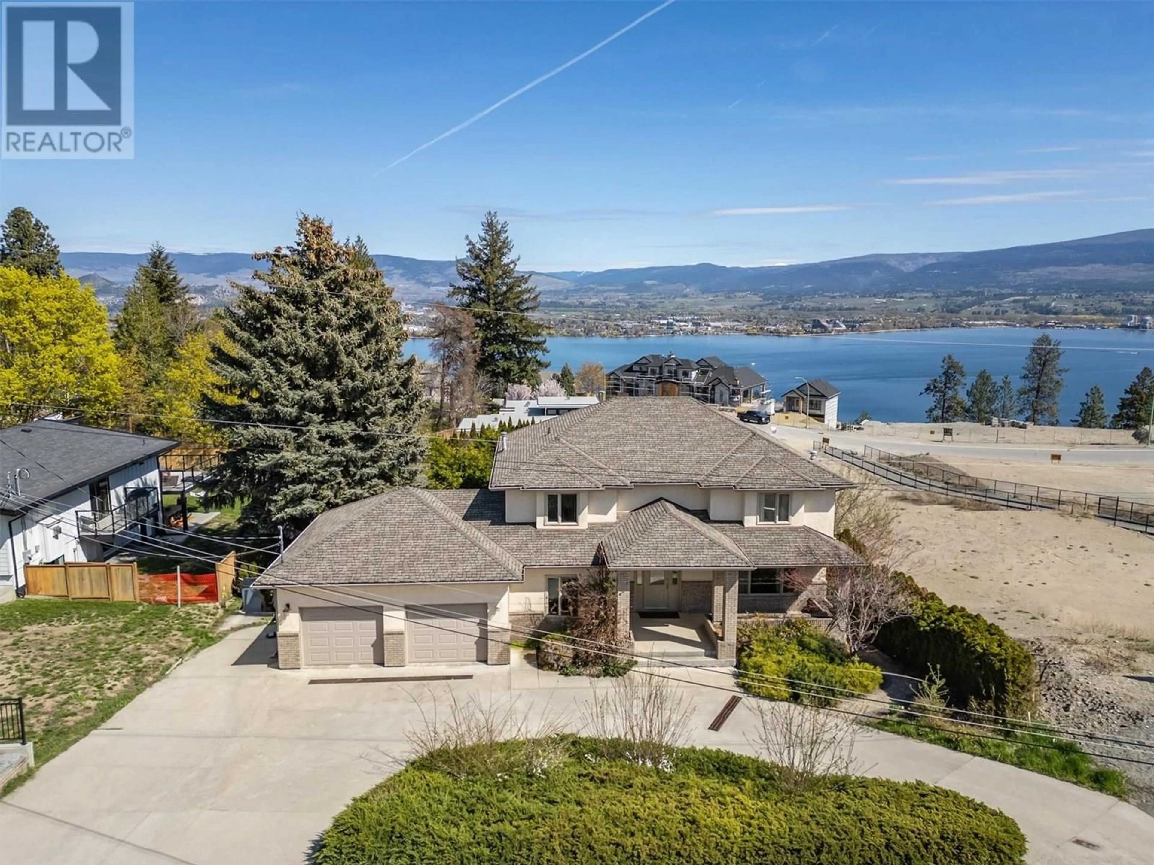 A pic from outside/outdoor area/front of a property/back of a property/a pic from drone, water/lake/river/ocean view for 2341 THACKER DRIVE, West Kelowna British Columbia V1Z1V6