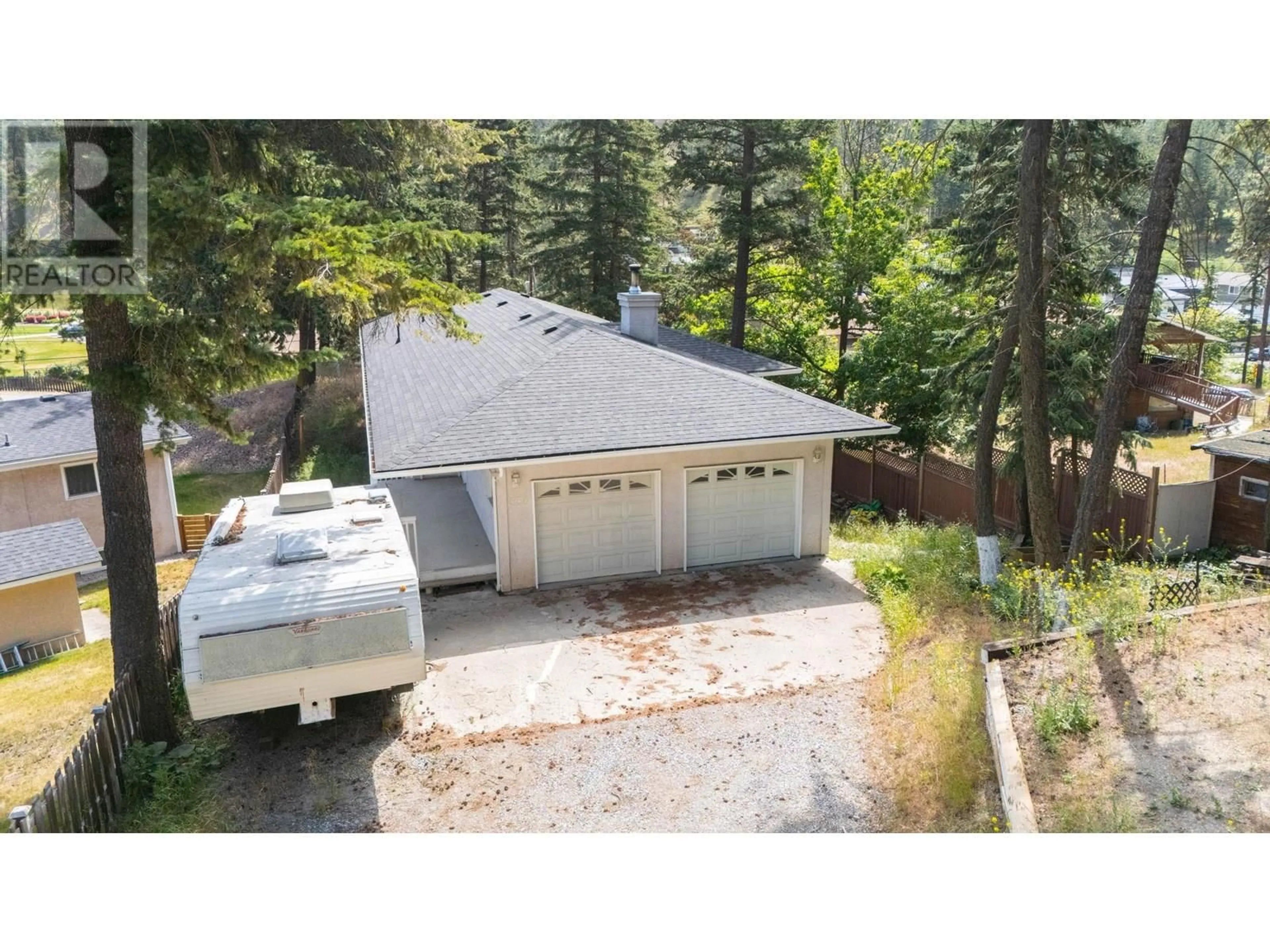 A pic from outside/outdoor area/front of a property/back of a property/a pic from drone, forest/trees view for 334 CLIFTON ROAD SOUTH, Kelowna British Columbia V1V1A5