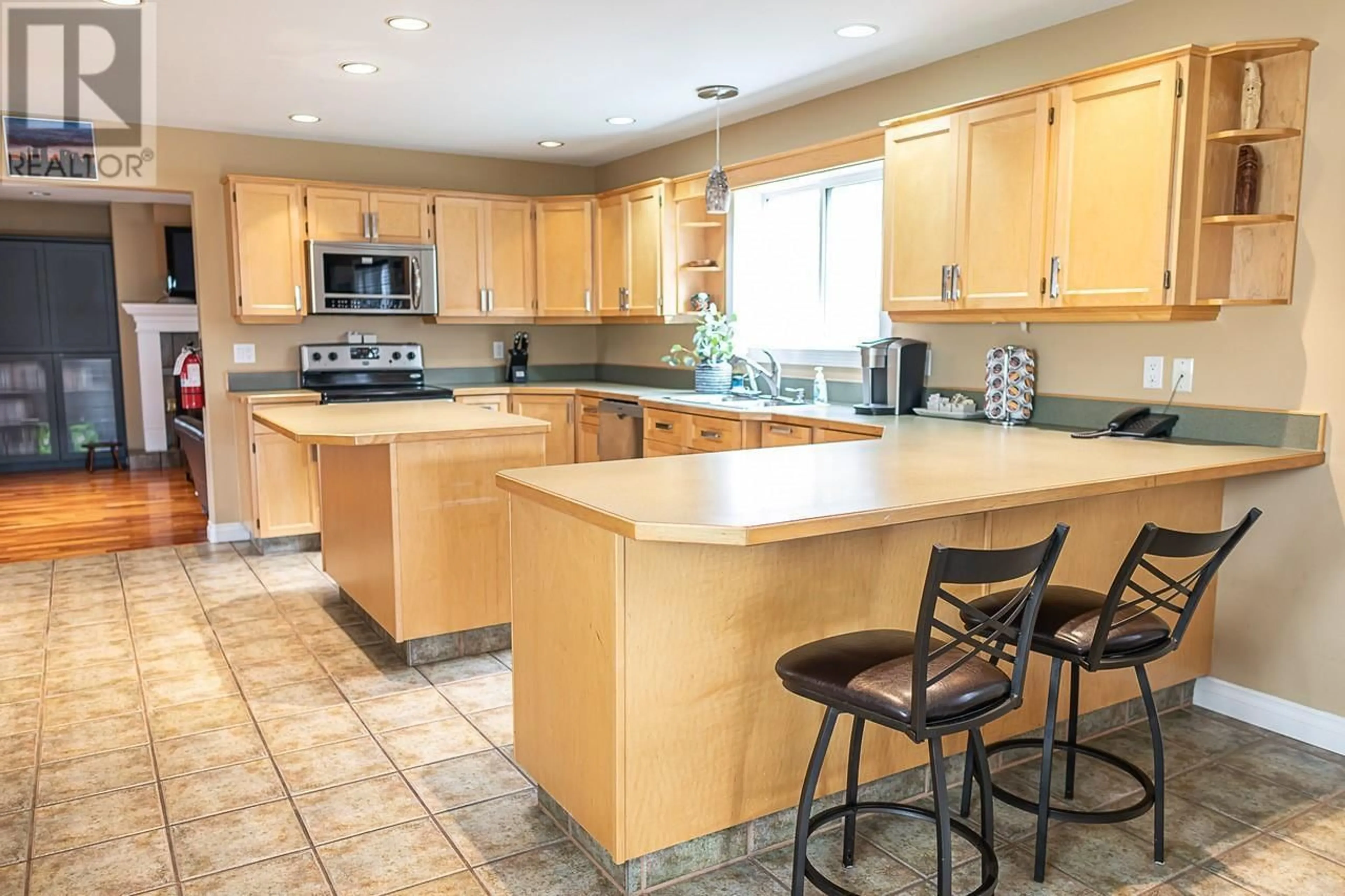 Open concept kitchen, ceramic/tile floor for 738 BALSAM AVENUE, Penticton British Columbia V2A7X2