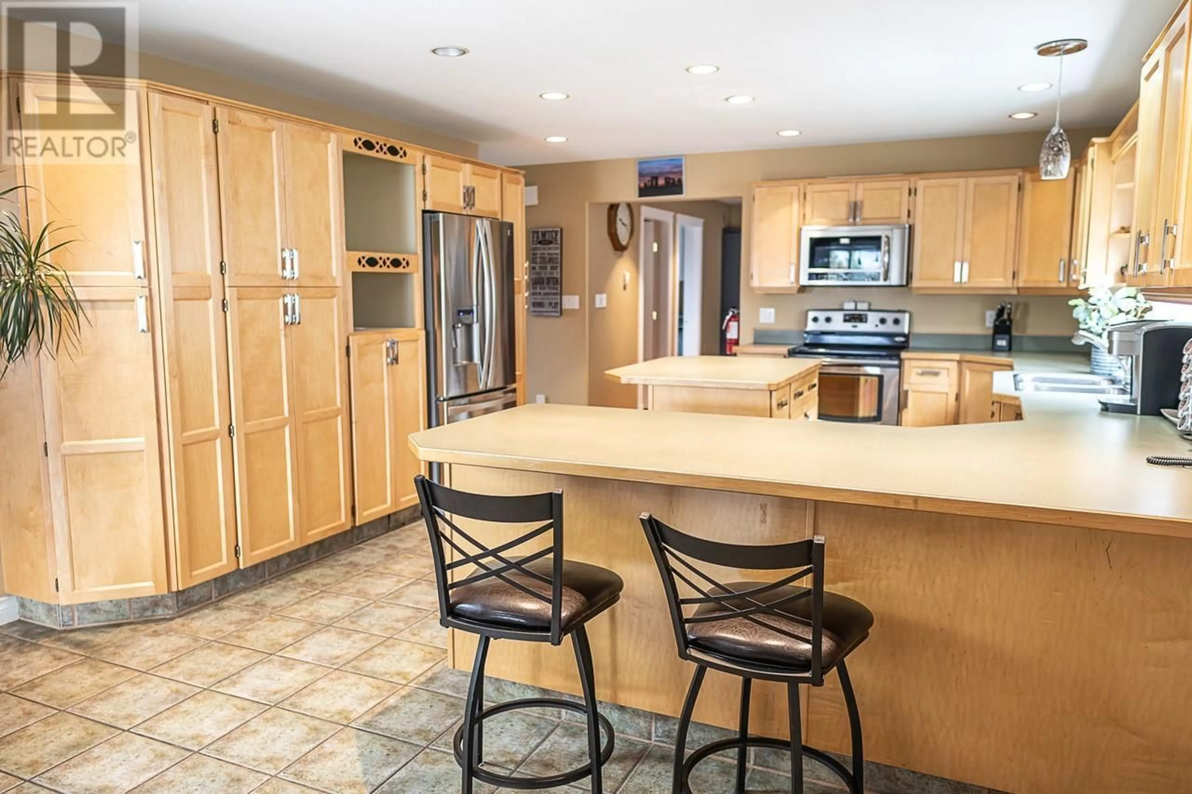 Open concept kitchen, ceramic/tile floor for 738 BALSAM AVENUE, Penticton British Columbia V2A7X2