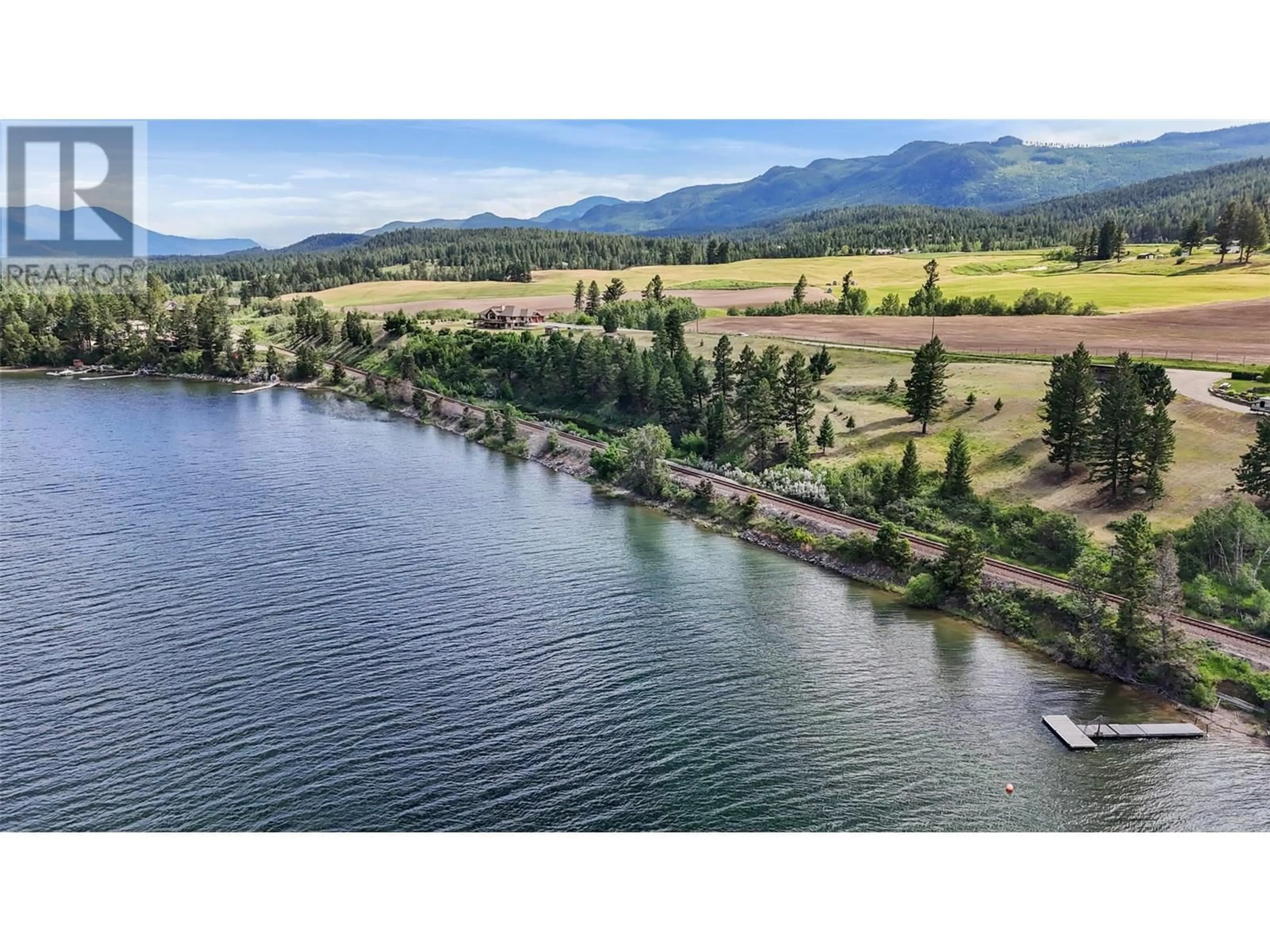 A pic from outside/outdoor area/front of a property/back of a property/a pic from drone, water/lake/river/ocean view for 2335 RUAULT ROAD, Invermere British Columbia V0A1K4